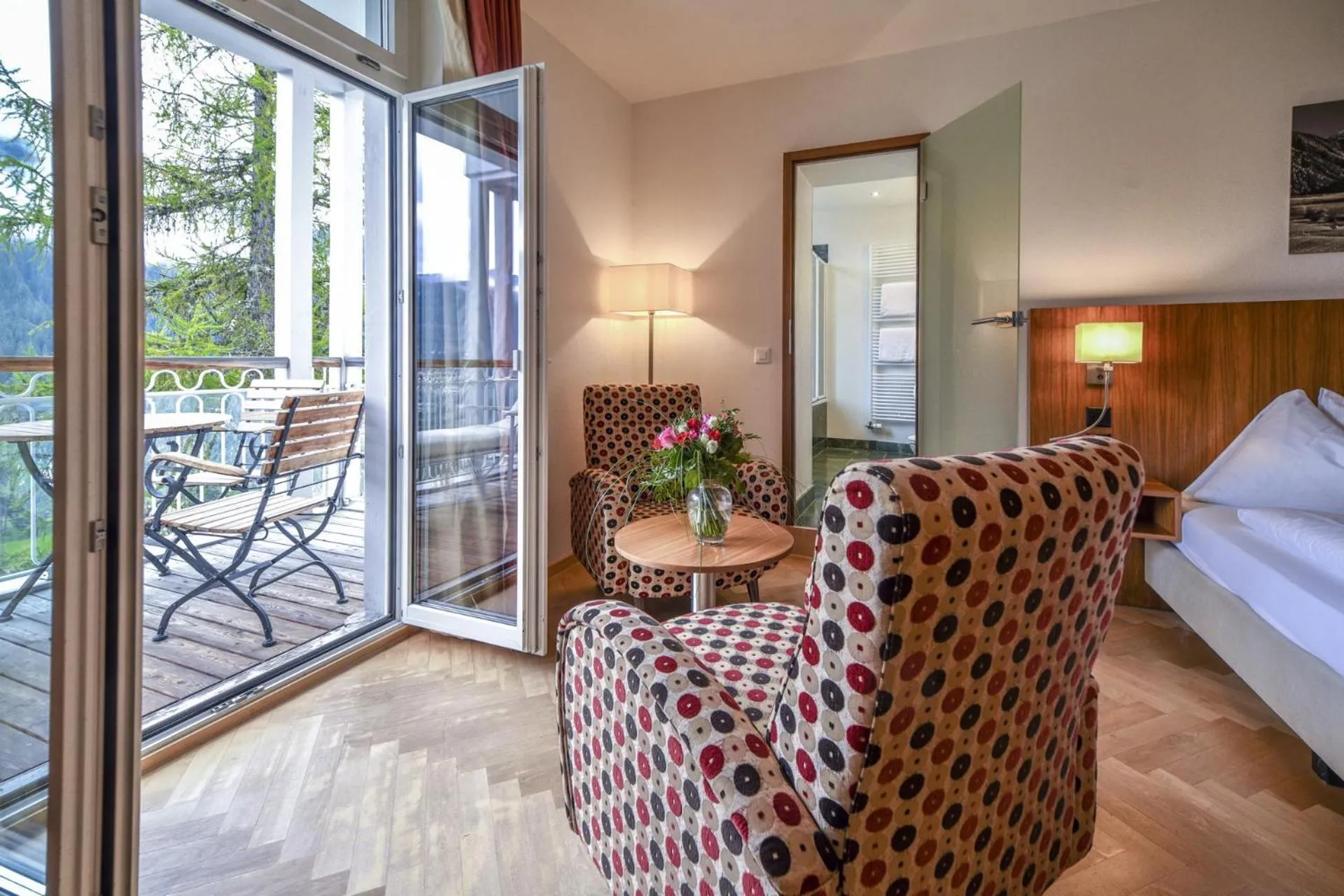 Photo of the whole room, Bed in Waldhotel & SPA Davos - for body & soul