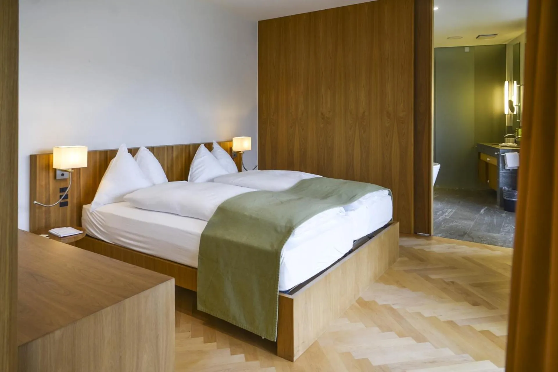 Photo of the whole room, Bed in Waldhotel & SPA Davos - for body & soul