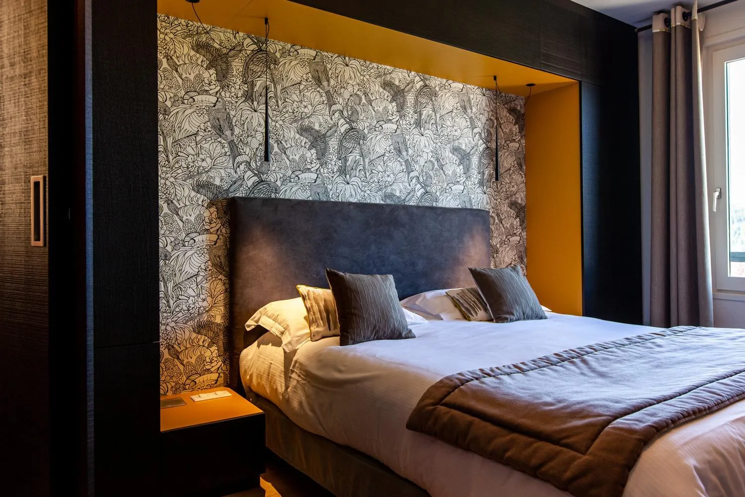 Bed in Logis Hotel Restaurant La Tour