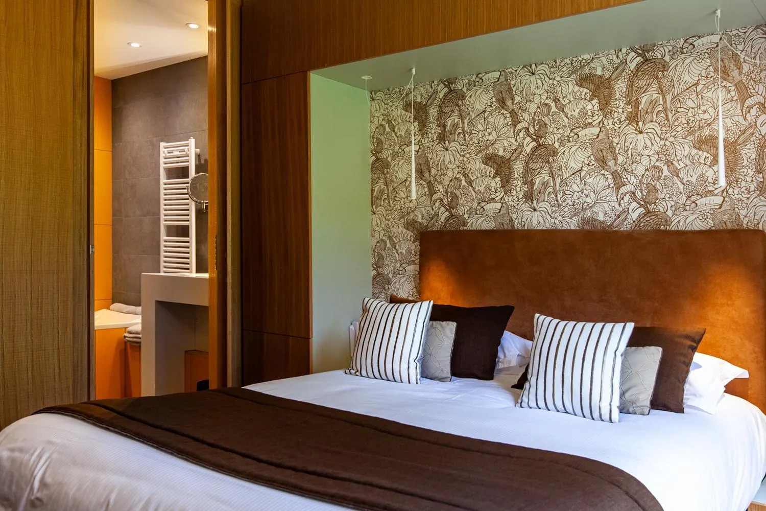 Bed in Logis Hotel Restaurant La Tour