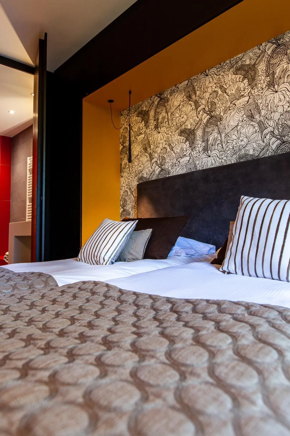 Bed in Logis Hotel Restaurant La Tour