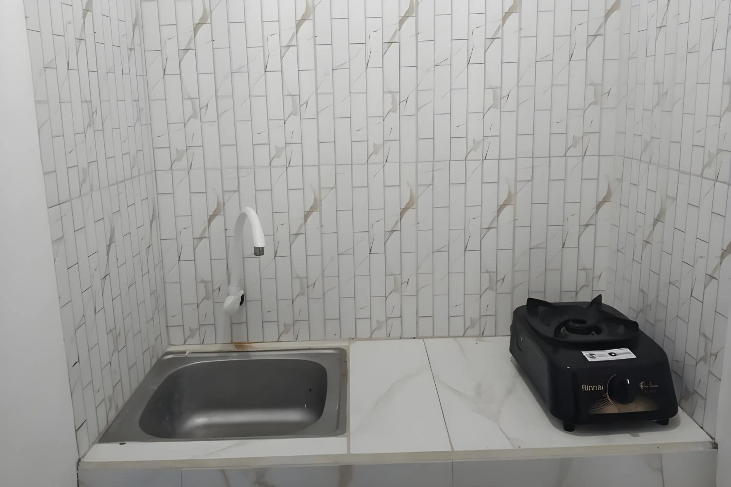 kitchen in Penginapan Erbysa