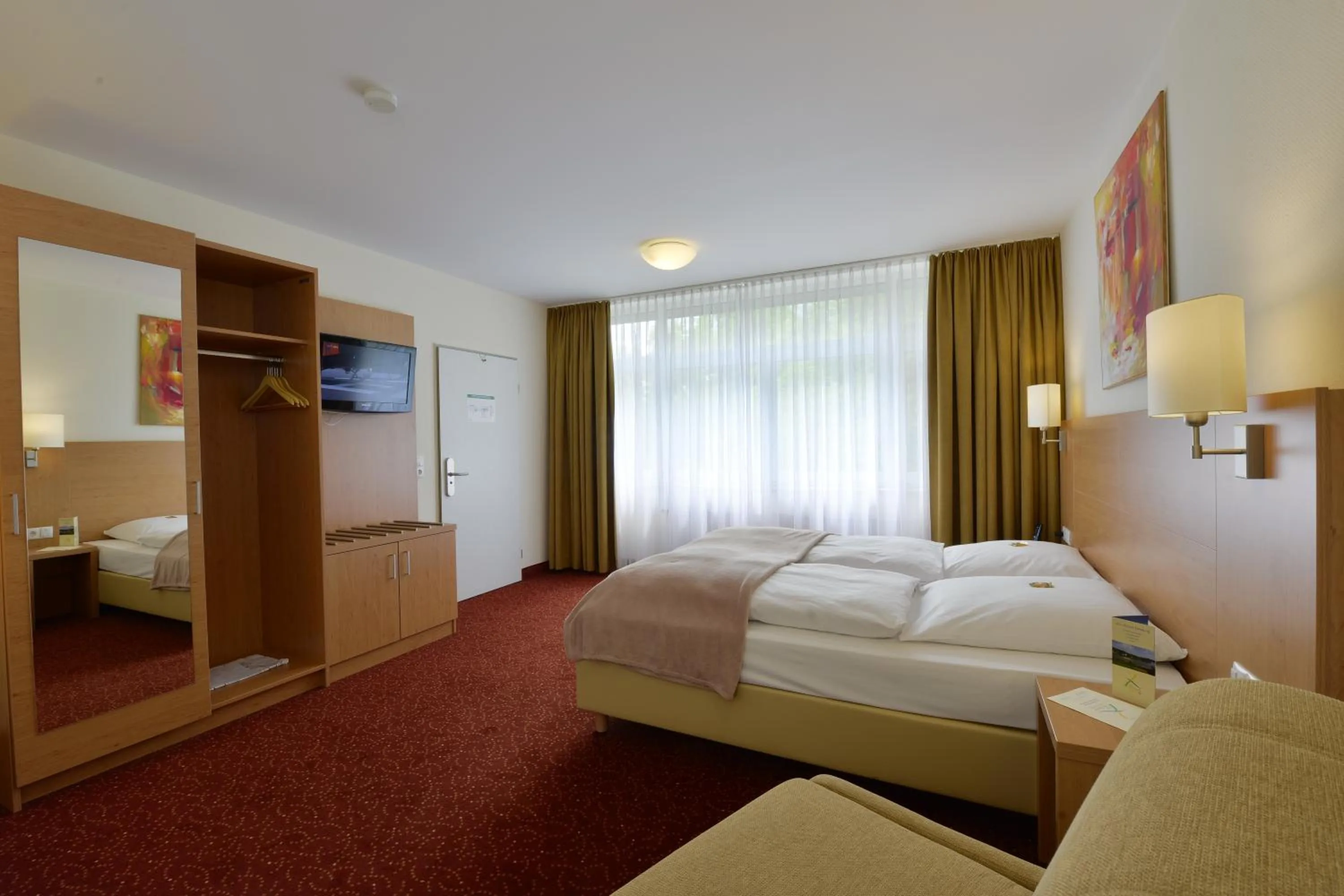 Photo of the whole room, Bed in Ringhotel Haus Oberwinter