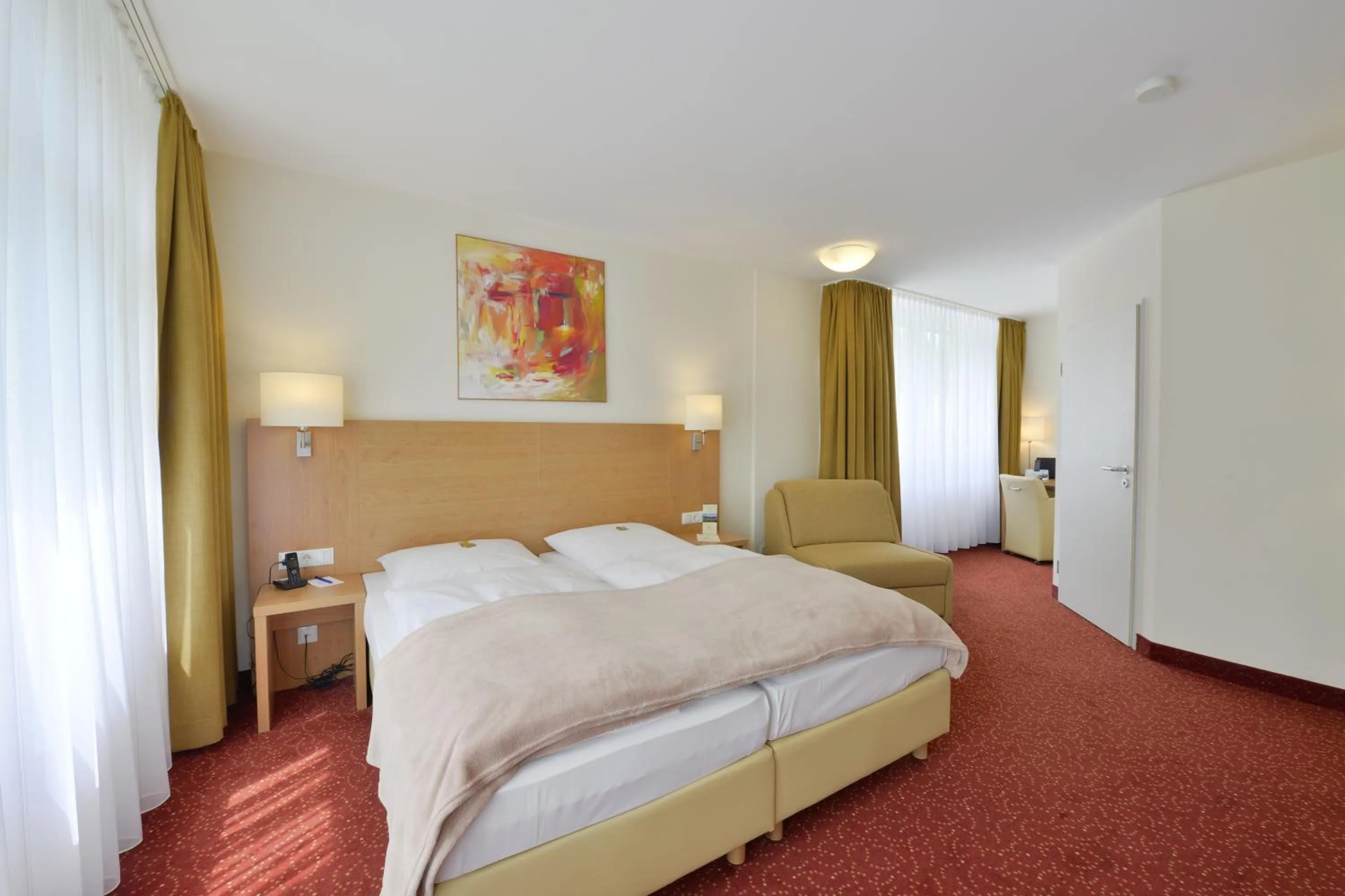 Photo of the whole room, Bed in Ringhotel Haus Oberwinter