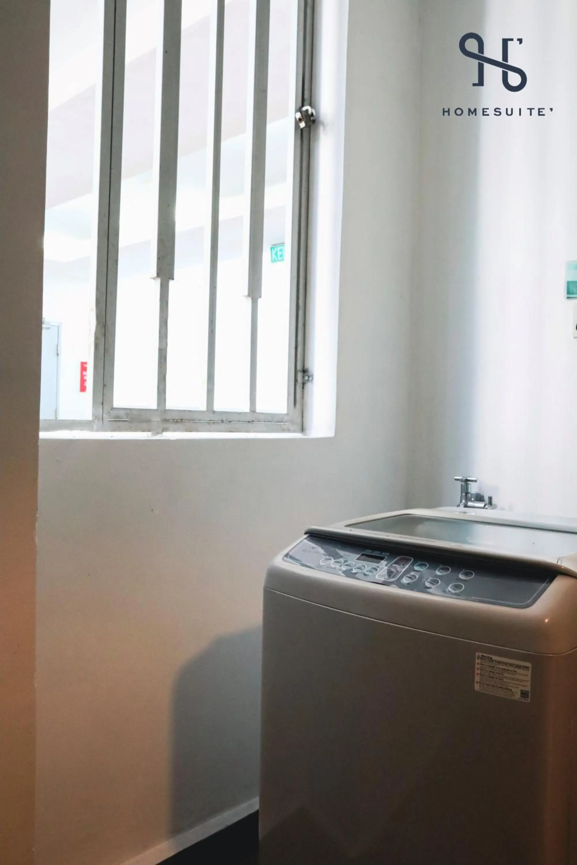 washing machine in Homesuite' Home at Sutera Avenue