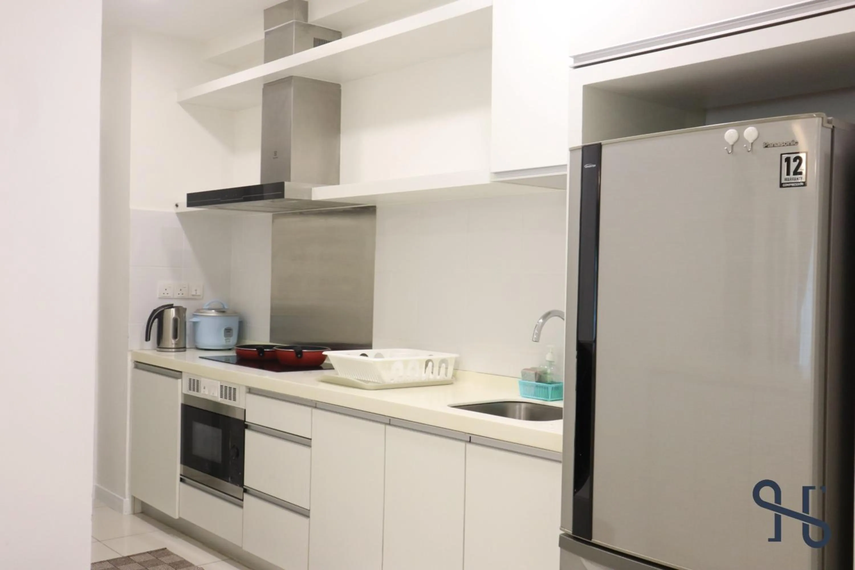 Kitchen or kitchenette in Homesuite' Home at Sutera Avenue