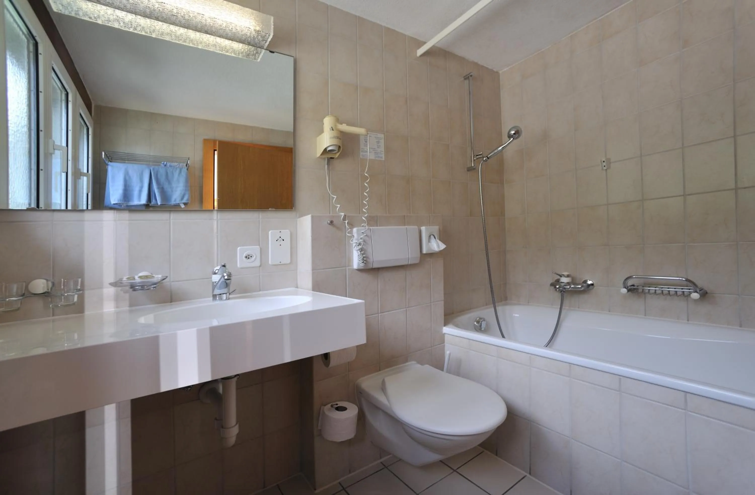 Bathroom in Hotel THE LARIX ski-in ski-out