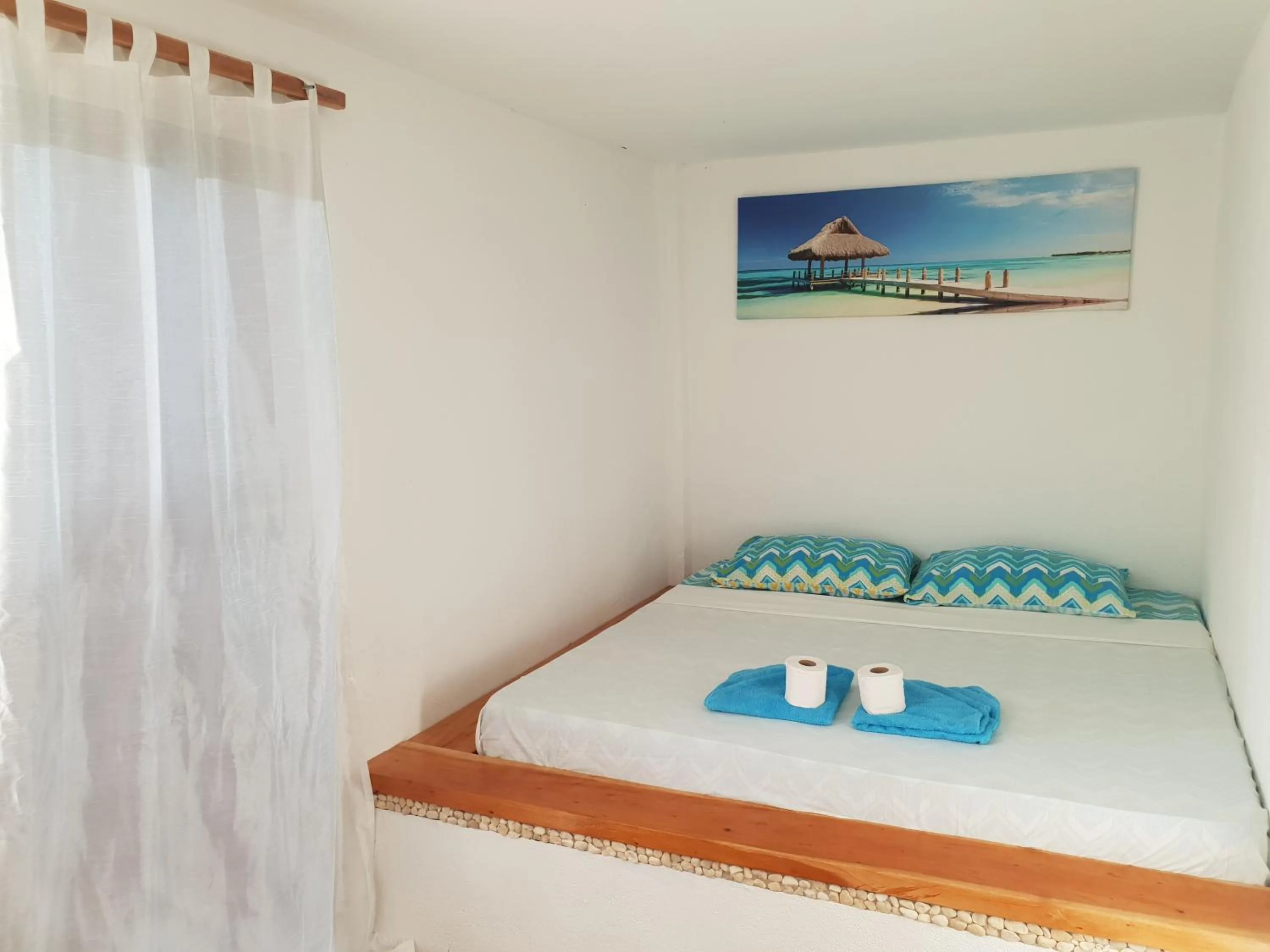 Bed in Apo Diver Beach Resort