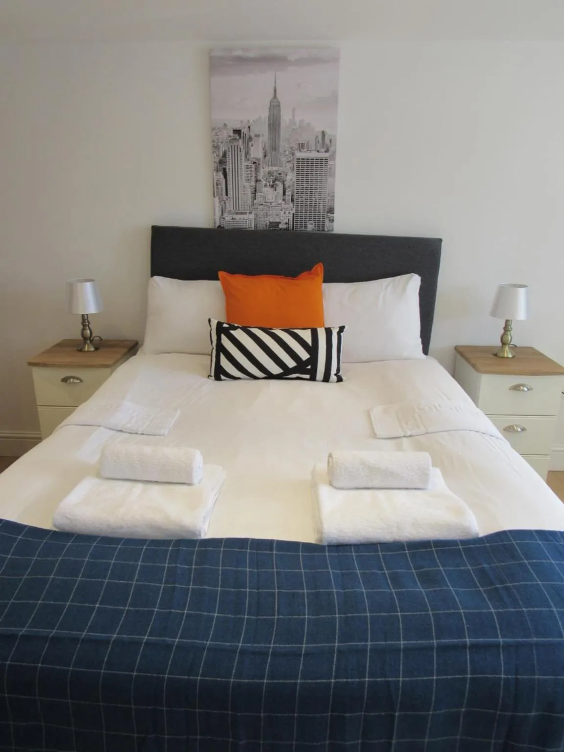 Bed in The Cambridge Suites - Tas Accommodations