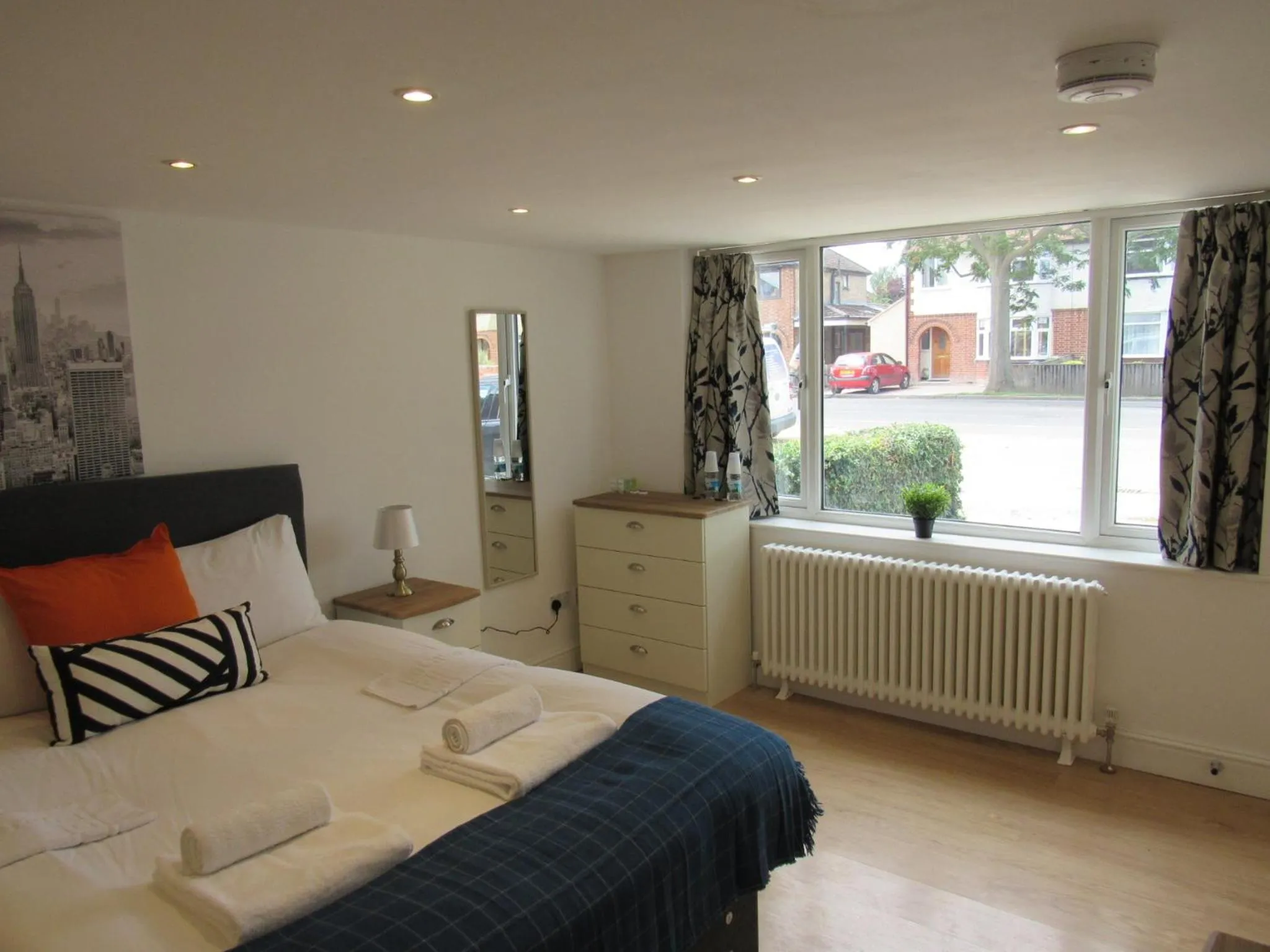 Bed in The Cambridge Suites - Tas Accommodations