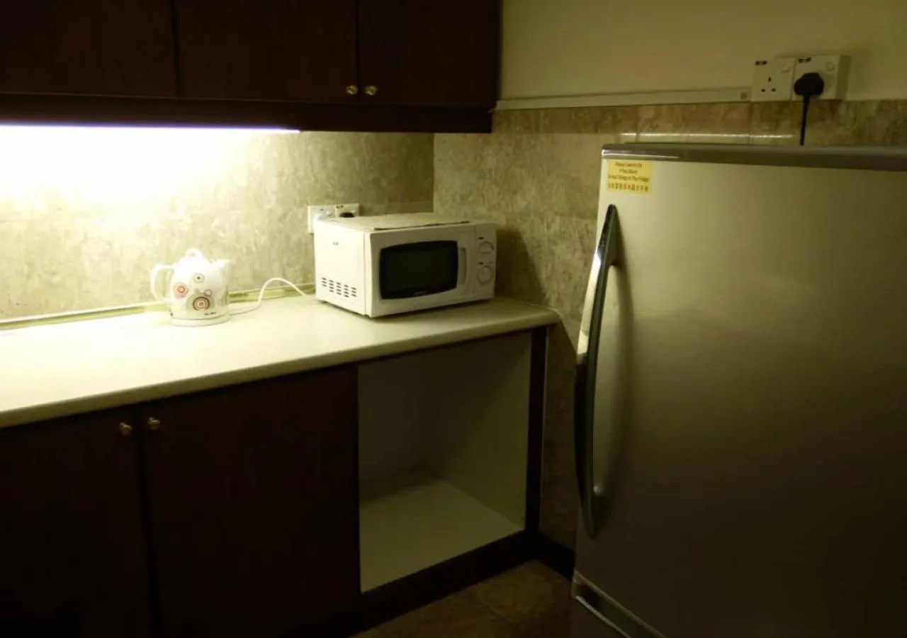 Kitchen or kitchenette in KL Universal Suites at Times Square