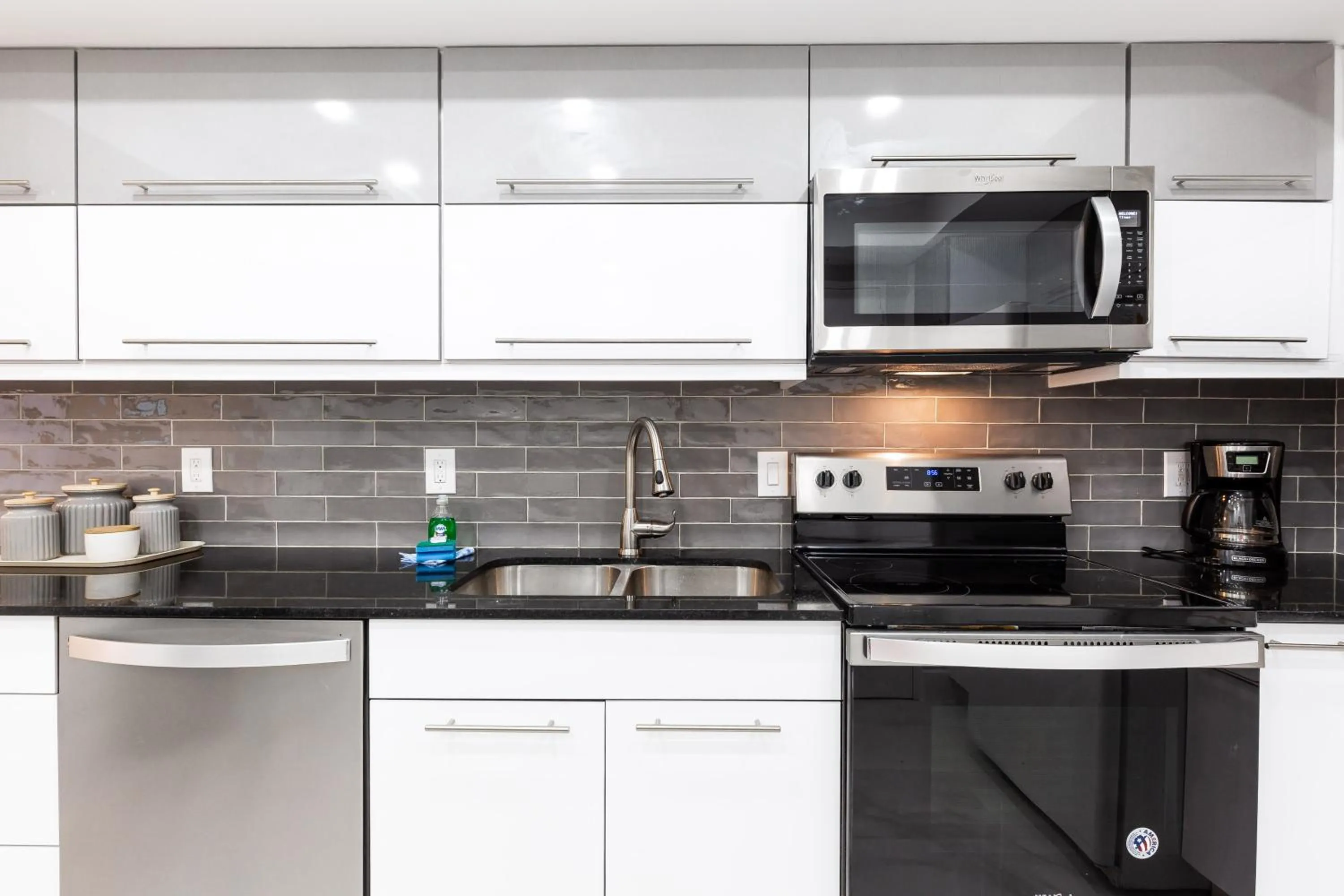 Kitchen or kitchenette in The Tides Ocean Luxury Suites