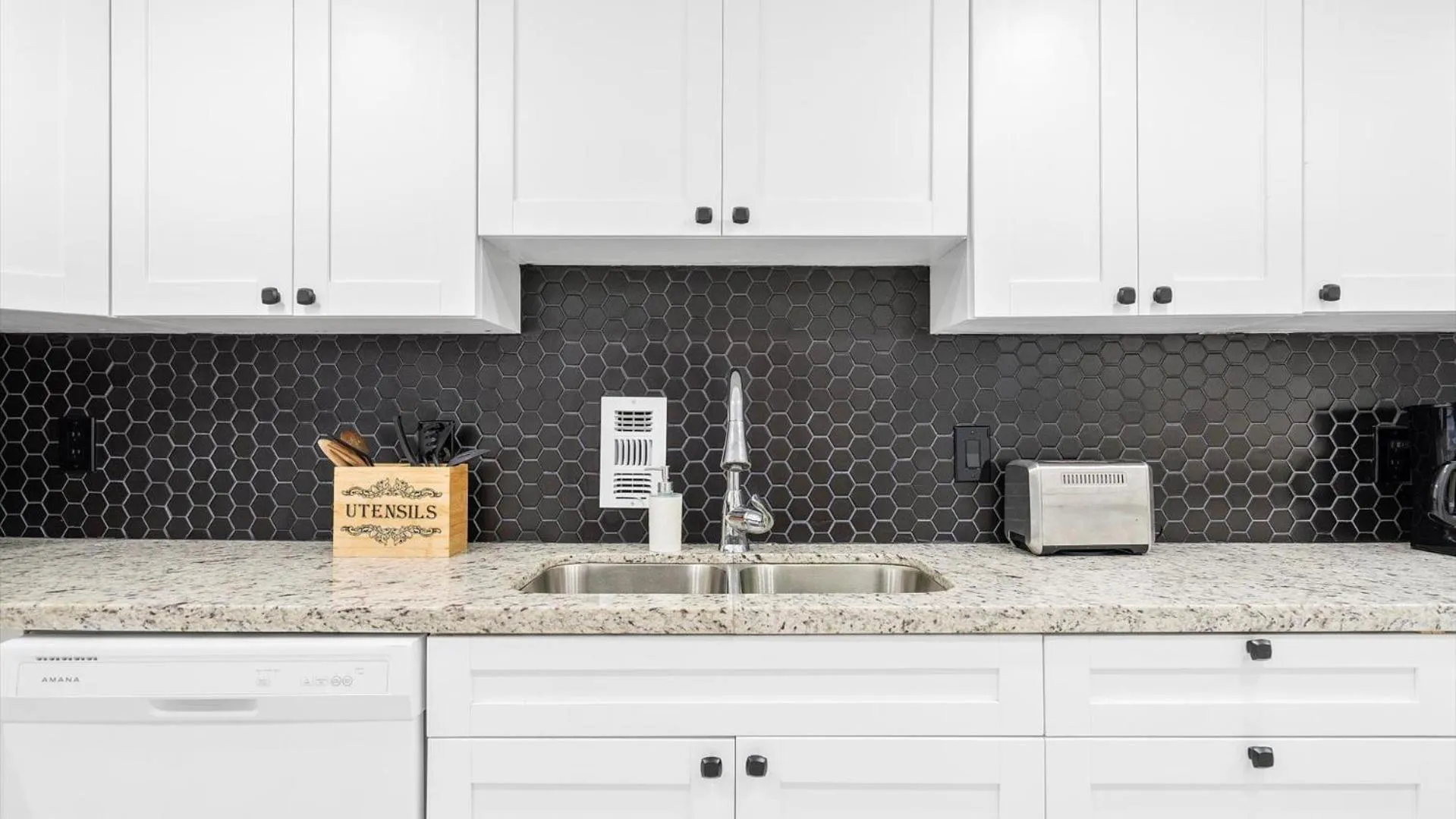 Kitchen or kitchenette in The Tides Ocean Luxury Suites