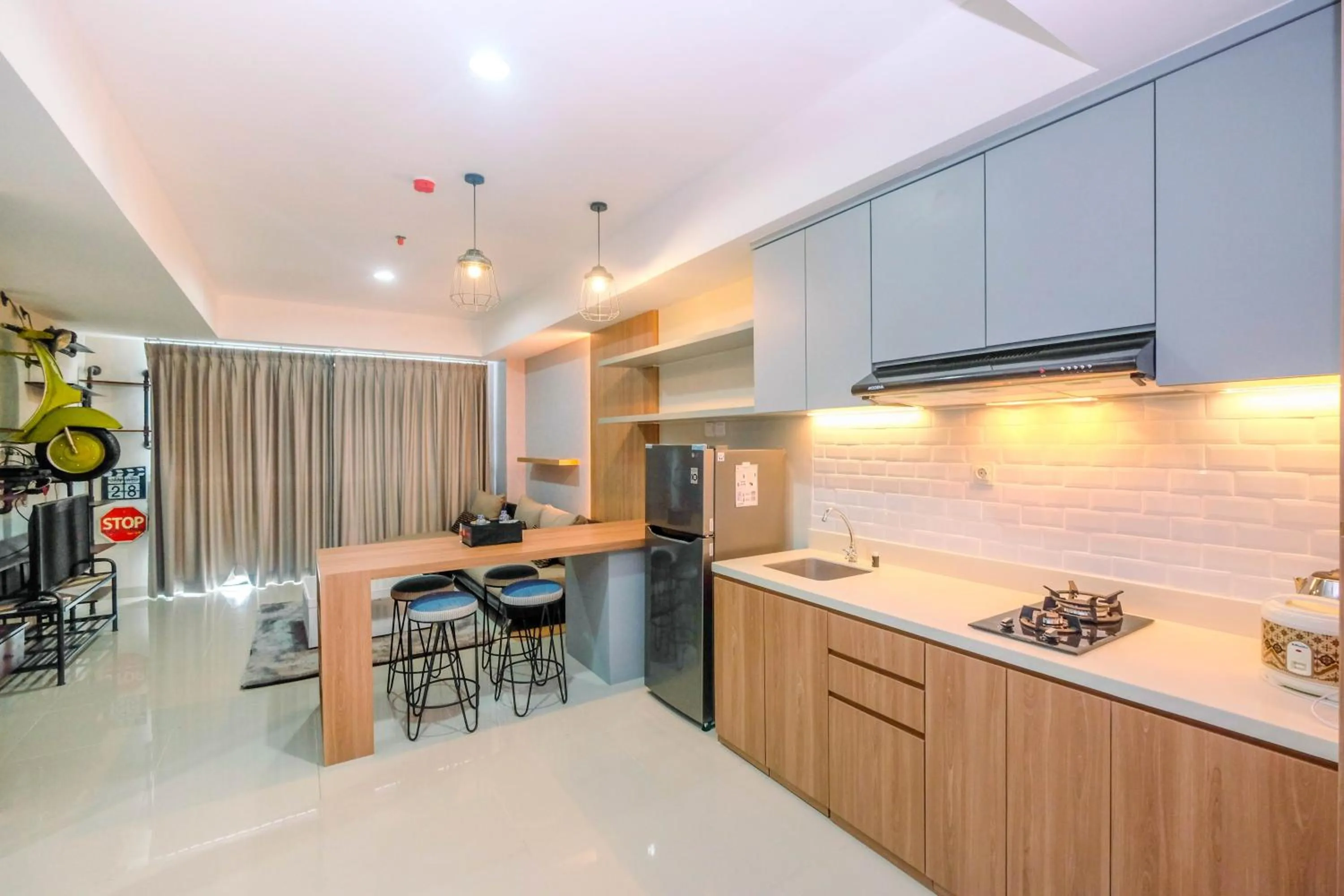 Cozy 2BR Apartment Nine Residence with City View By Travelio