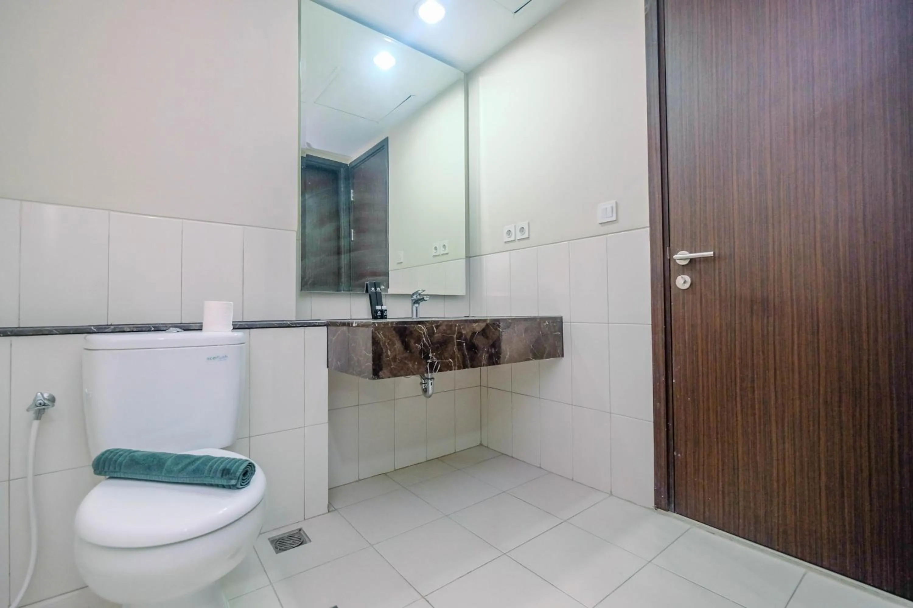 Cozy 2BR Apartment Nine Residence with City View By Travelio