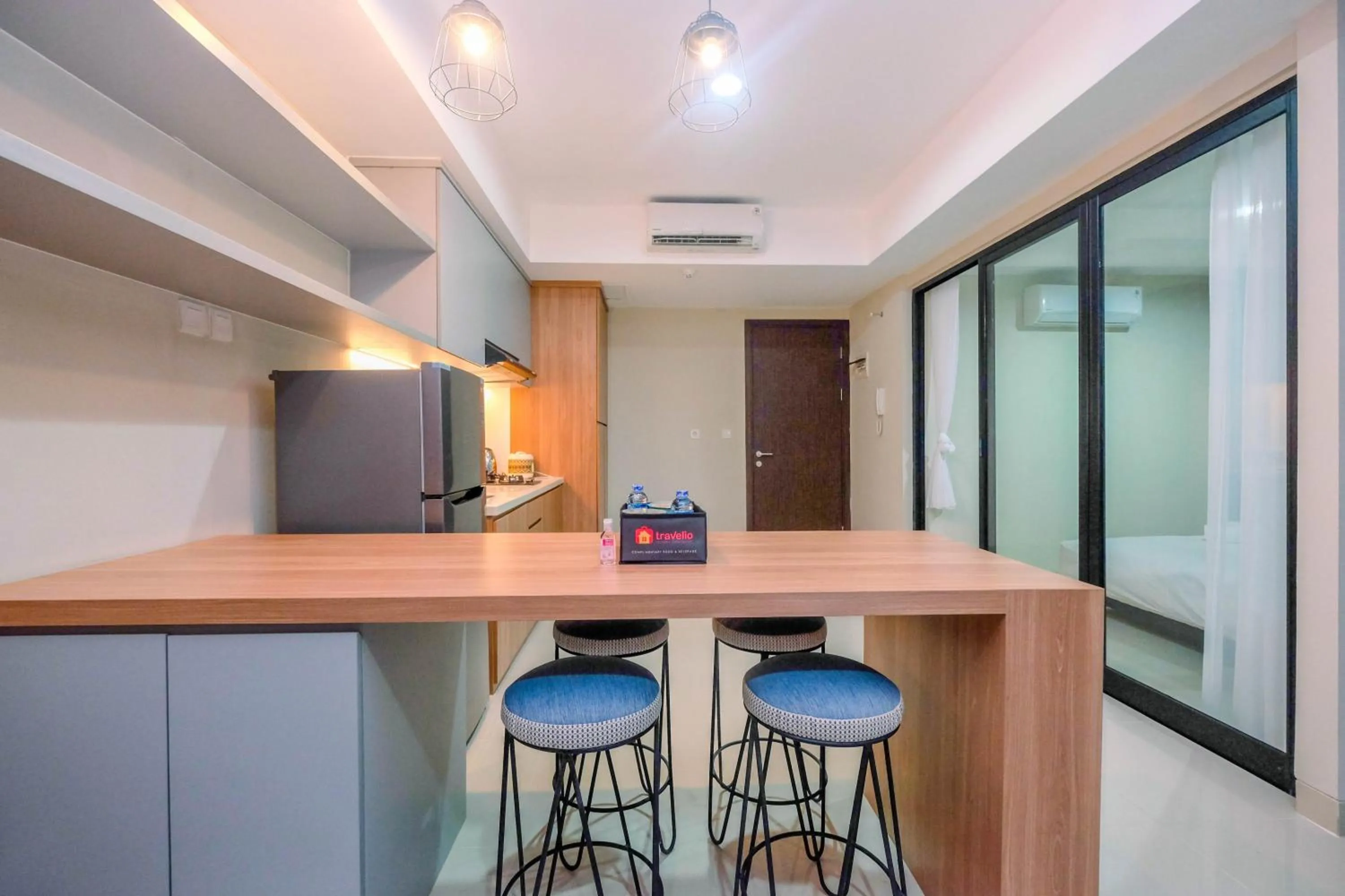 Cozy 2BR Apartment Nine Residence with City View By Travelio