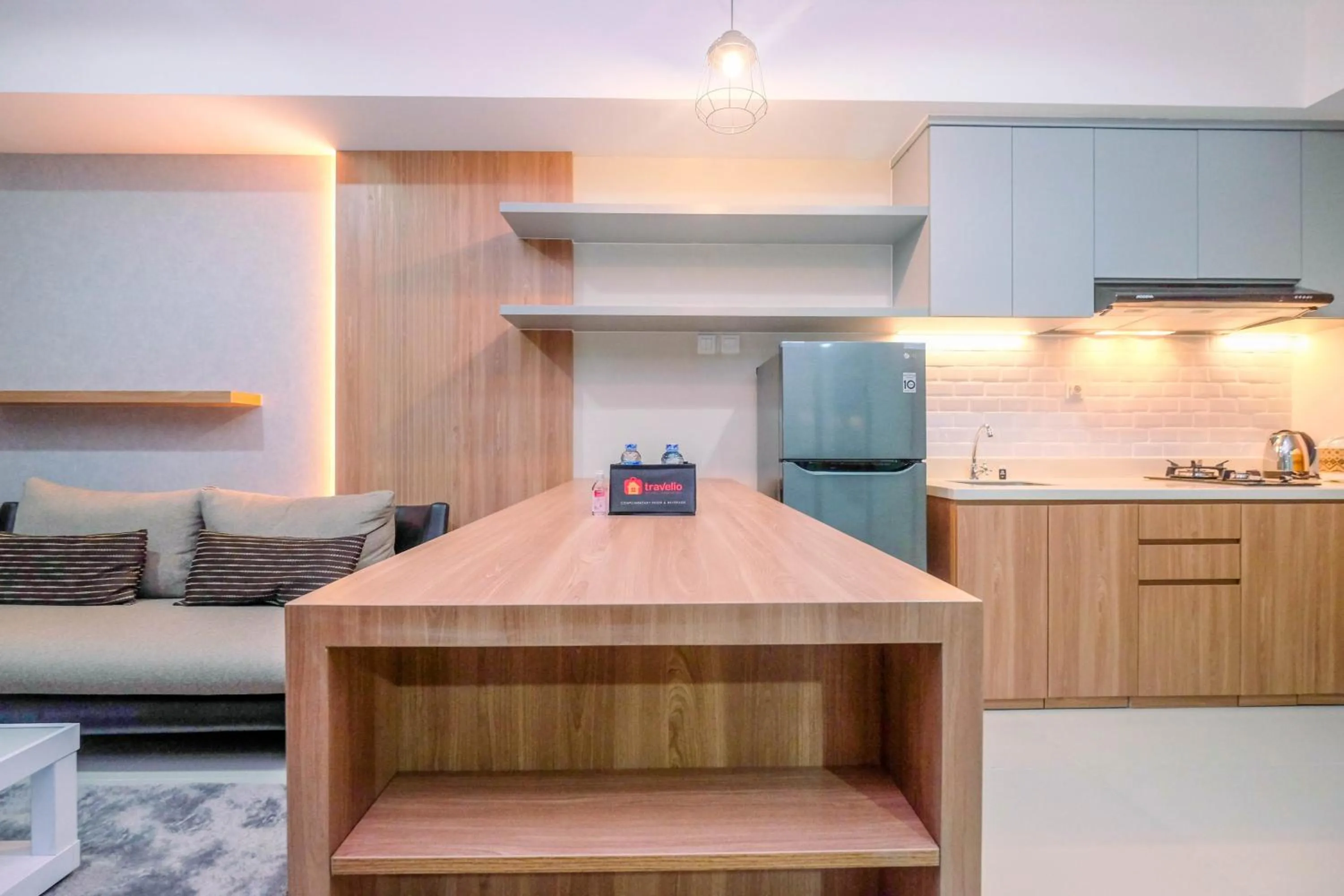 Cozy 2BR Apartment Nine Residence with City View By Travelio