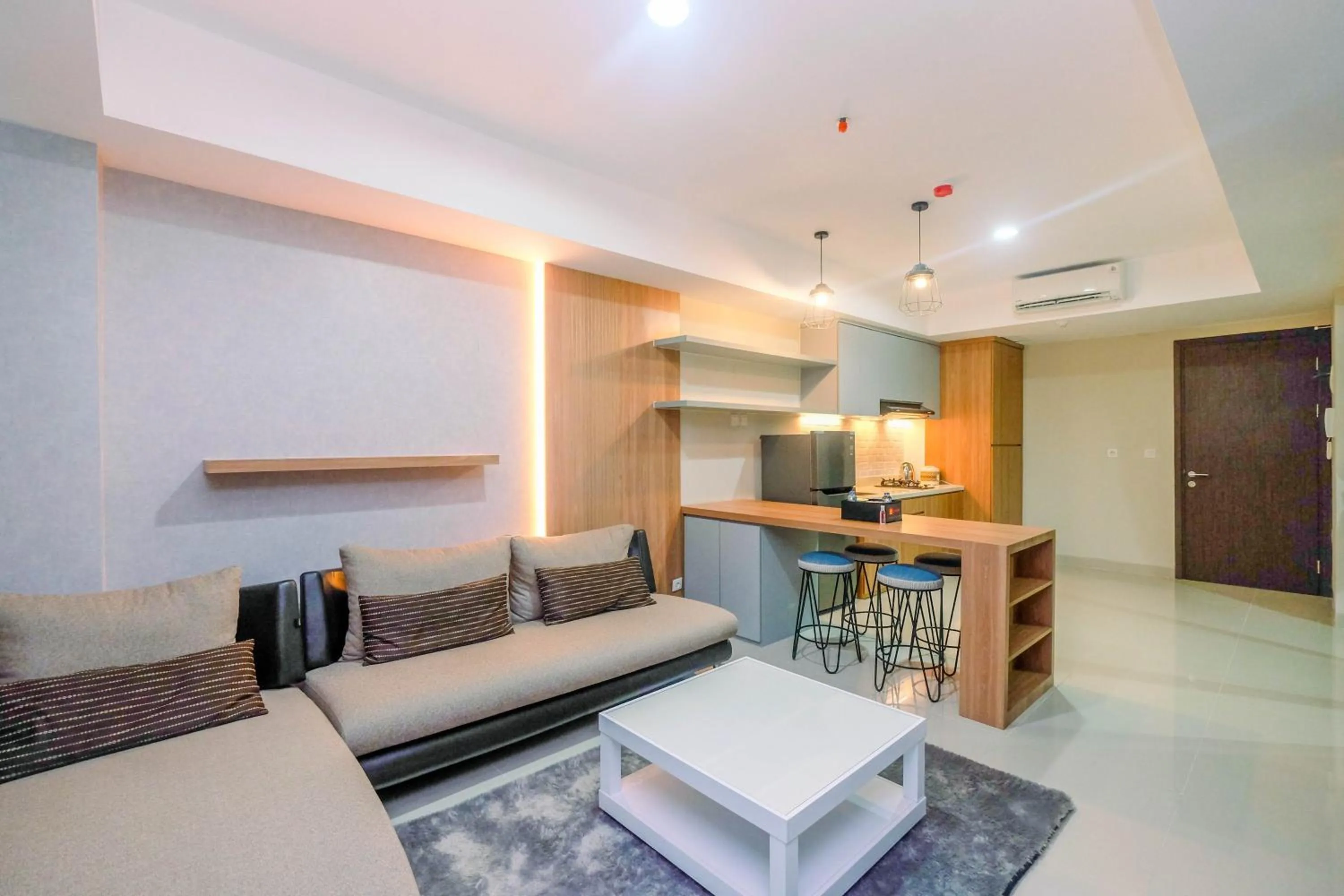 Cozy 2BR Apartment Nine Residence with City View By Travelio