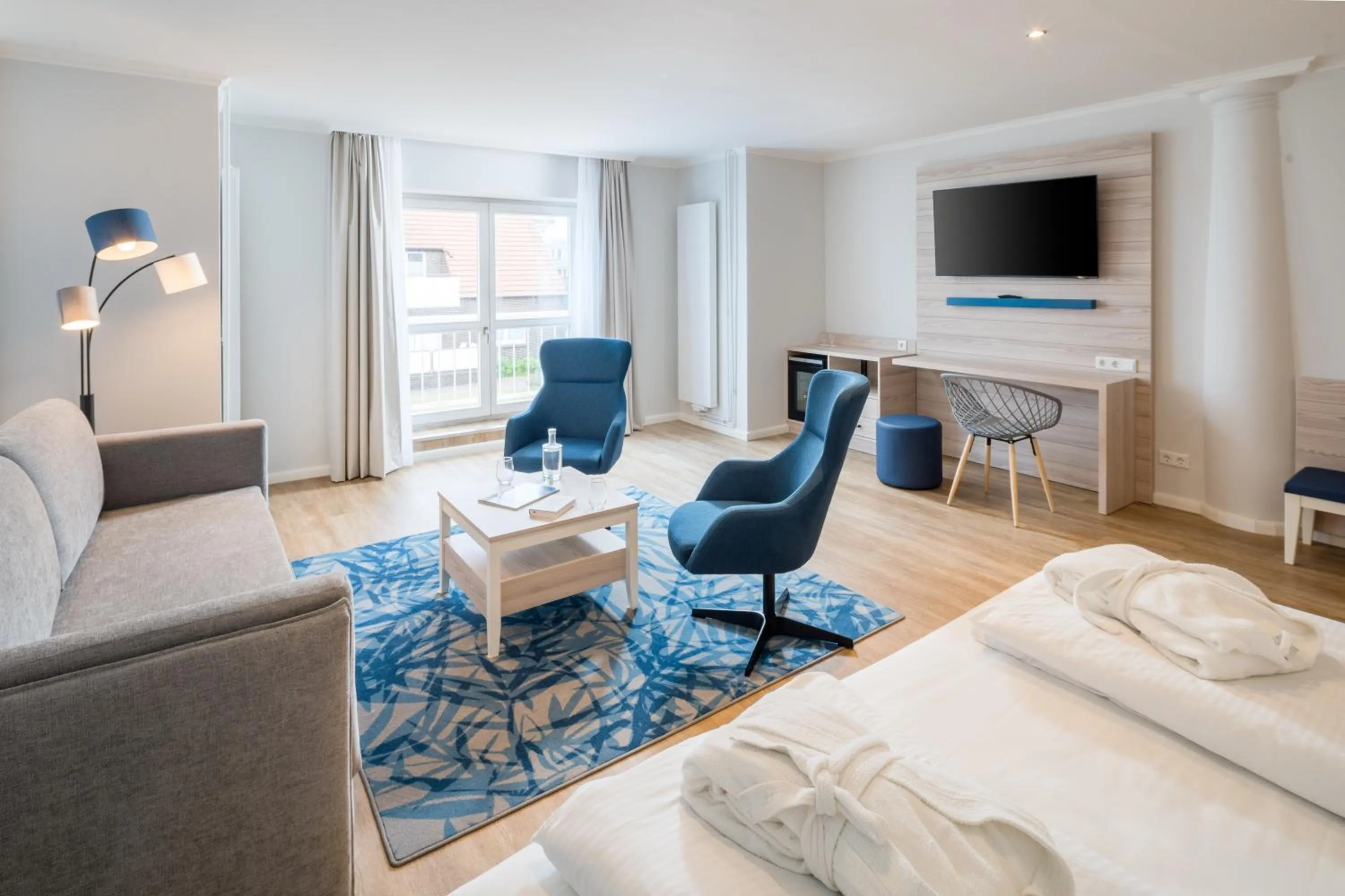 Photo of the whole room, Bed in Strandhotel Gerken