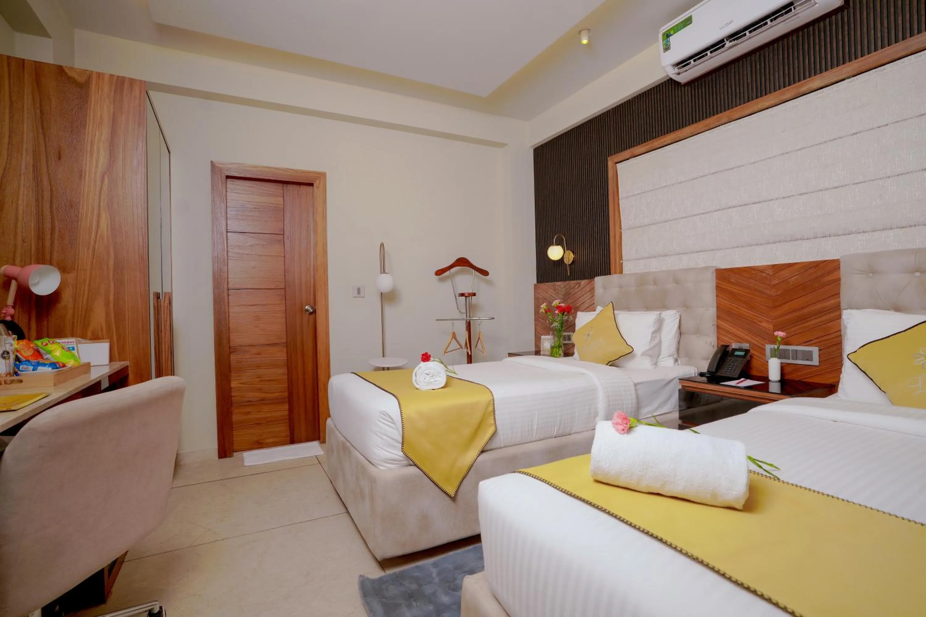 Bed in Lazdana Hotel Bangalore