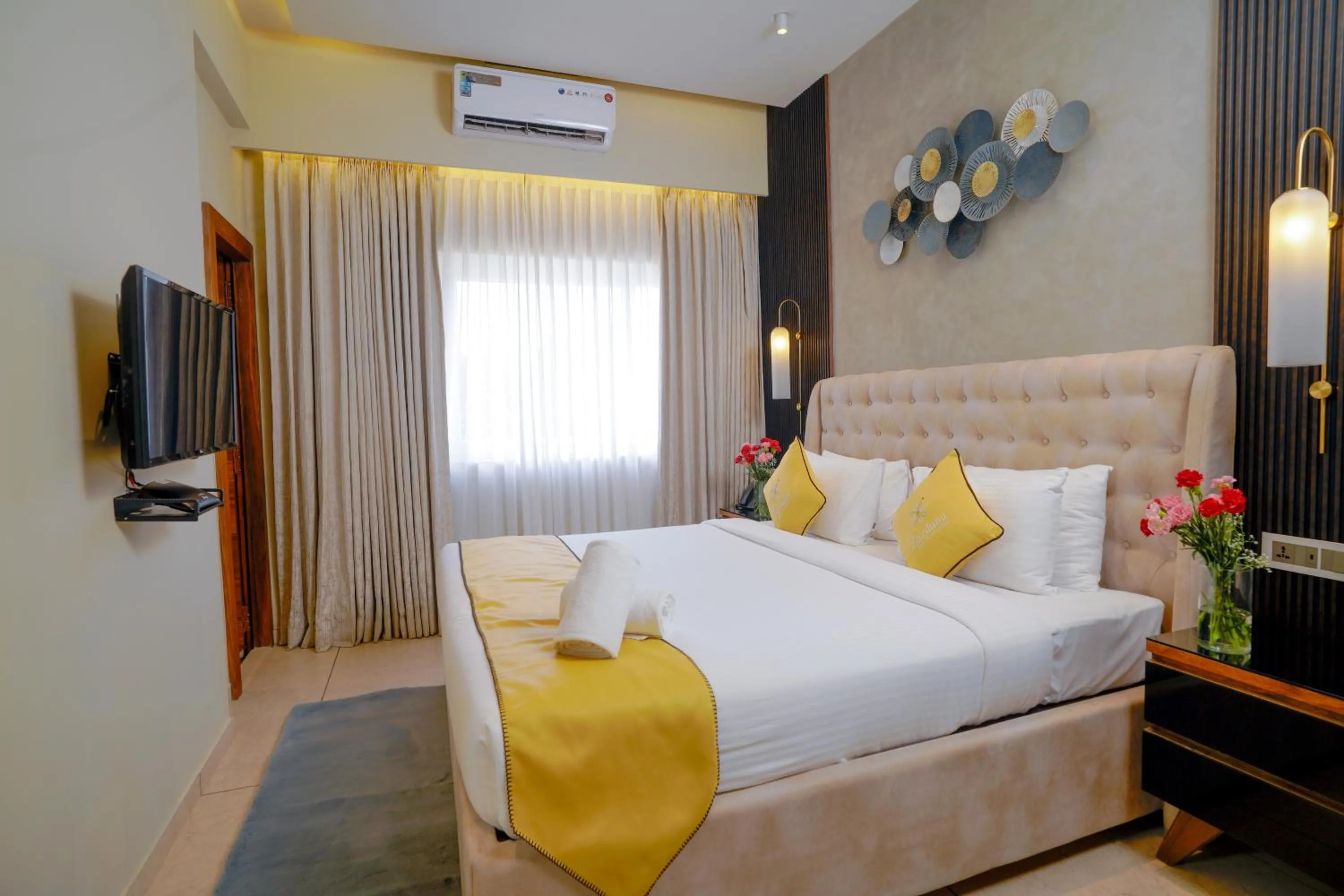 Bed in Lazdana Hotel Bangalore