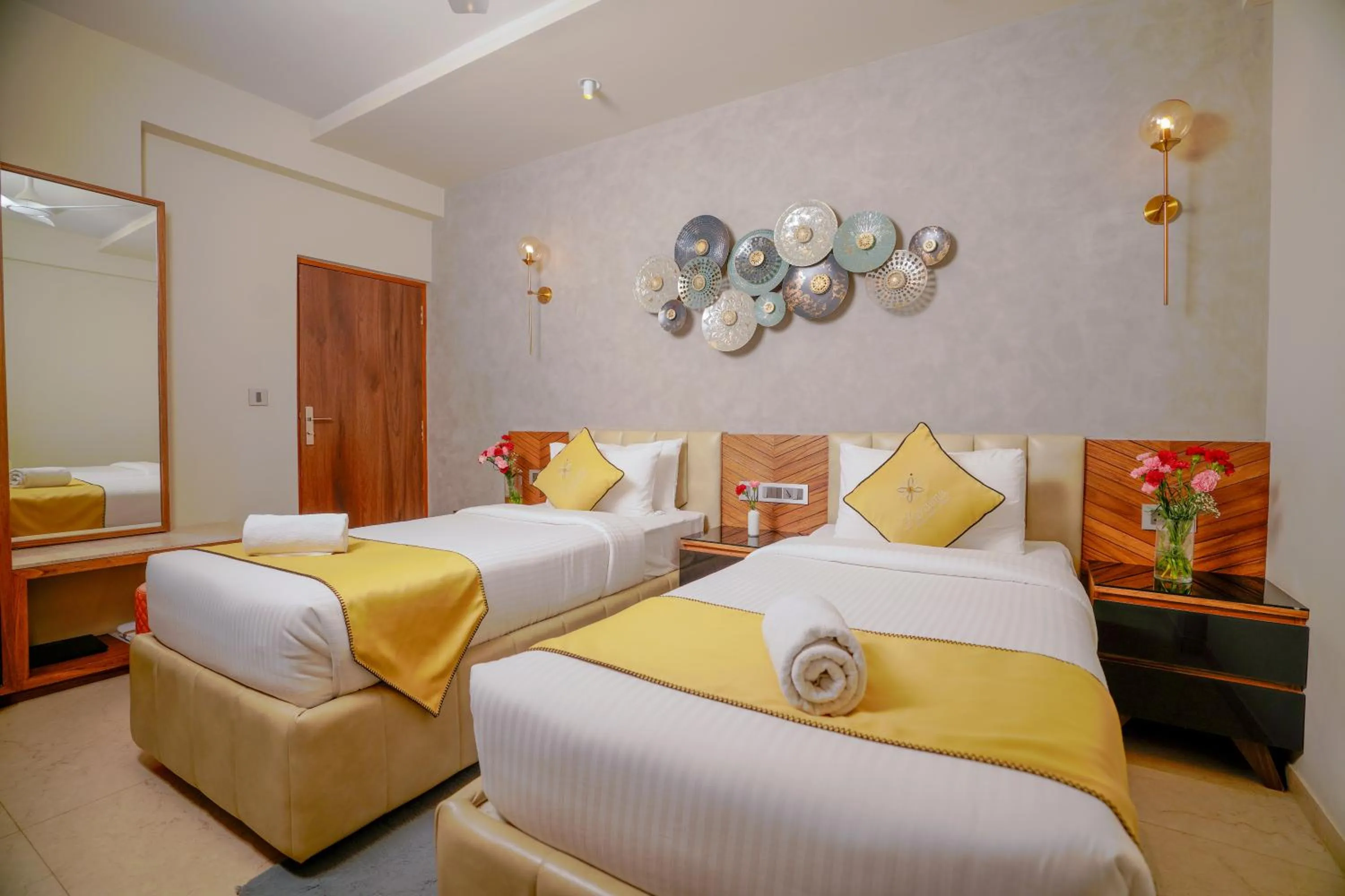 Bed in Lazdana Hotel Bangalore