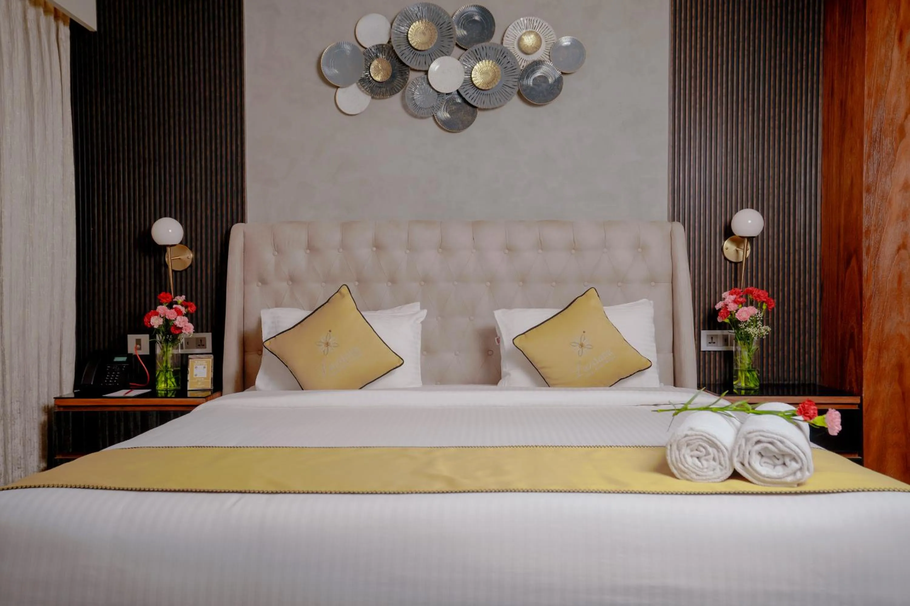 Bed in Lazdana Hotel Bangalore