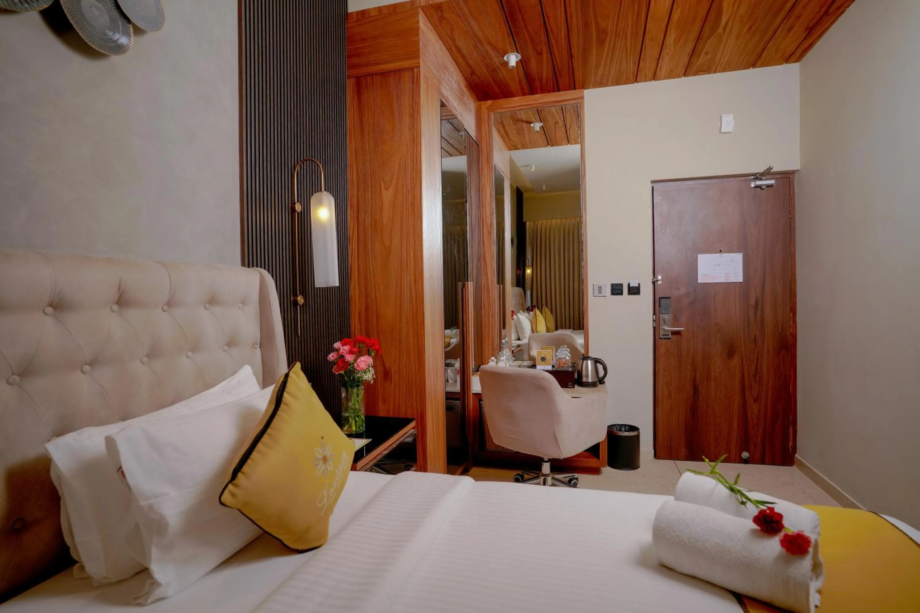 Bed in Lazdana Hotel Bangalore