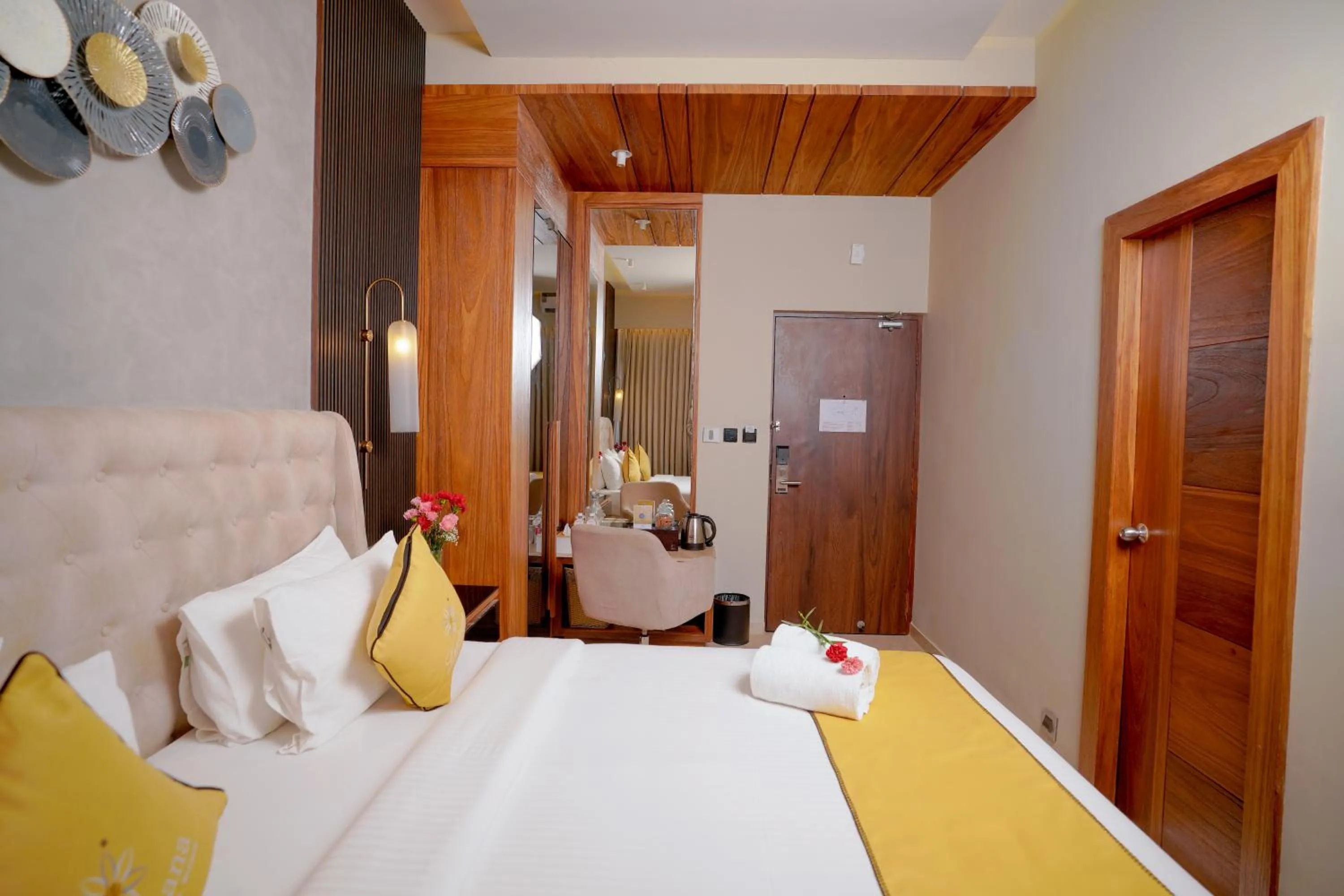 Bed in Lazdana Hotel Bangalore