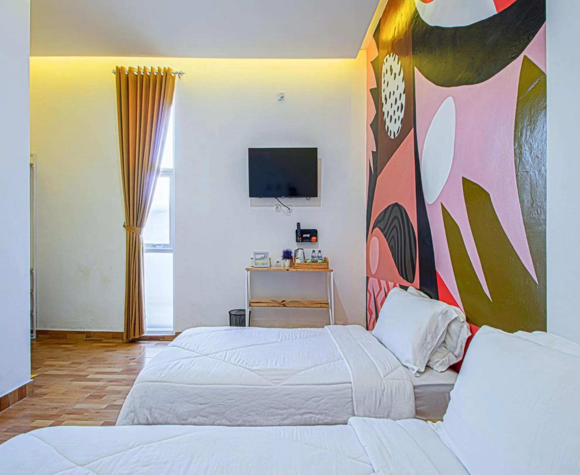 Bedroom, TV/Entertainment Center in D'Journey Hotel