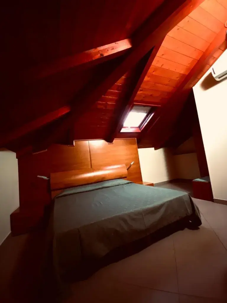 Quadruple Room - single occupancy in L'Aurora Quadruple Room - single occupancy in L'Aurora