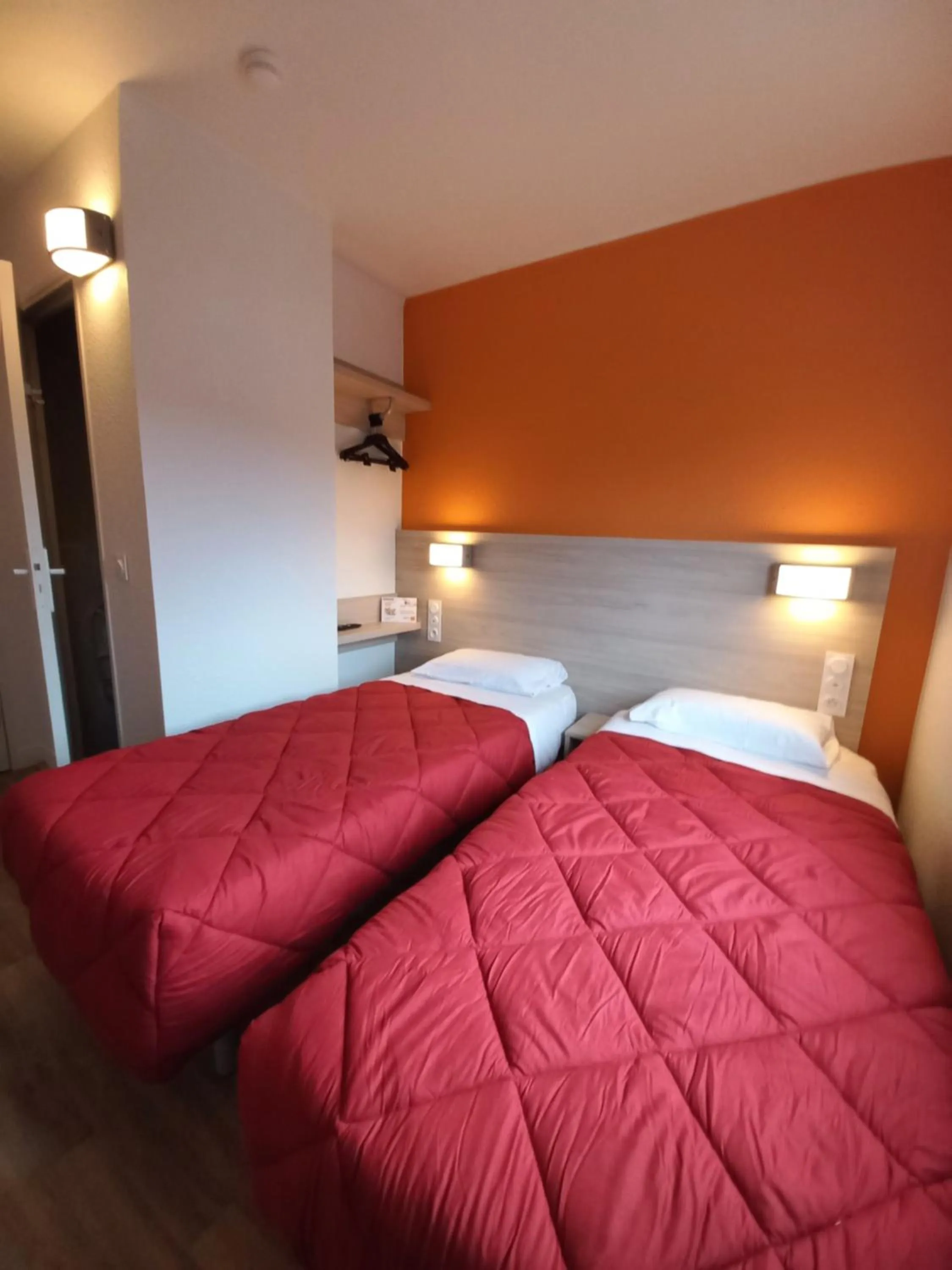 Bathroom, Bed in Premiere Classe Evry Sud - Mennecy