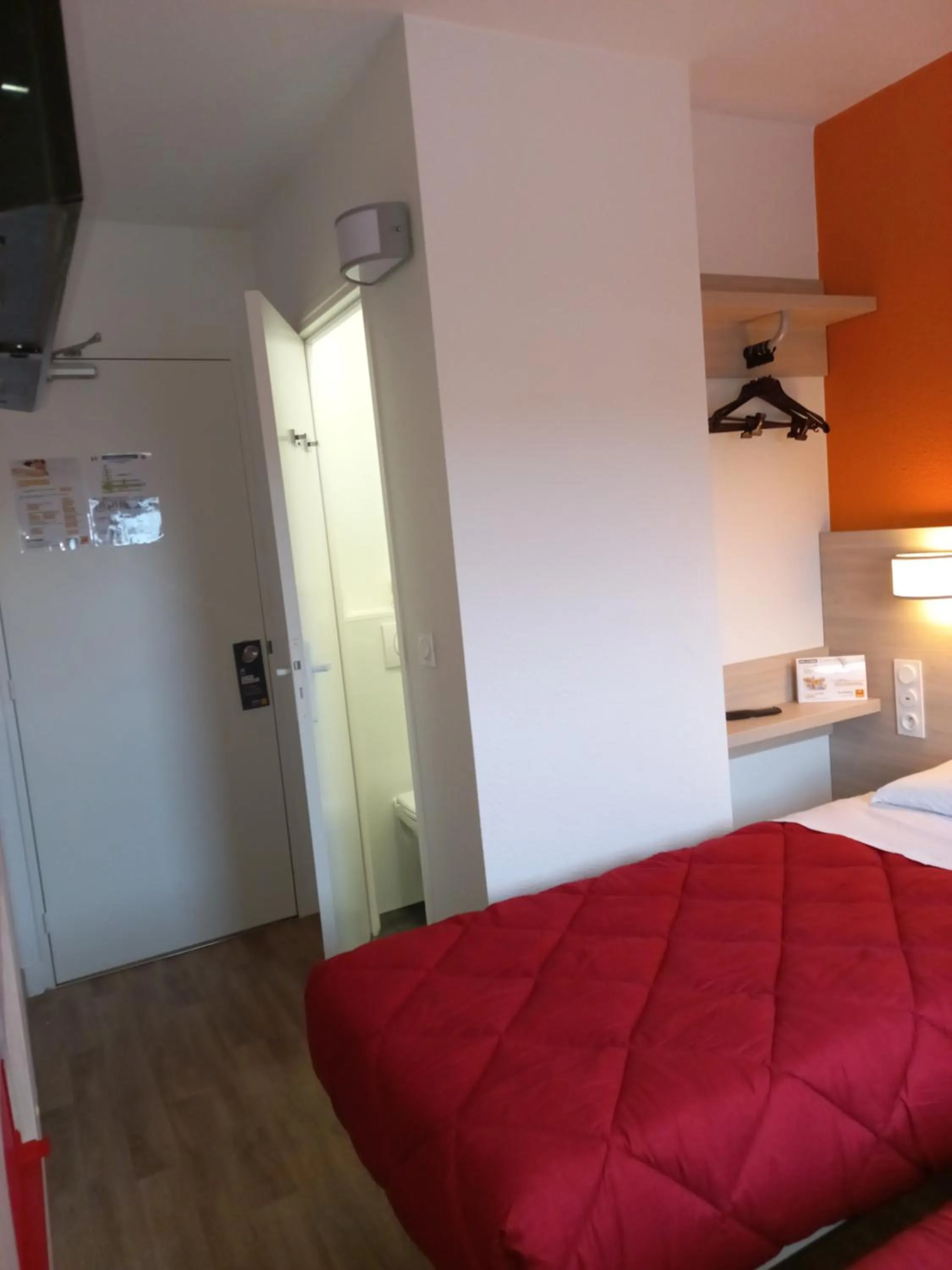 Bathroom, Bed in Premiere Classe Evry Sud - Mennecy