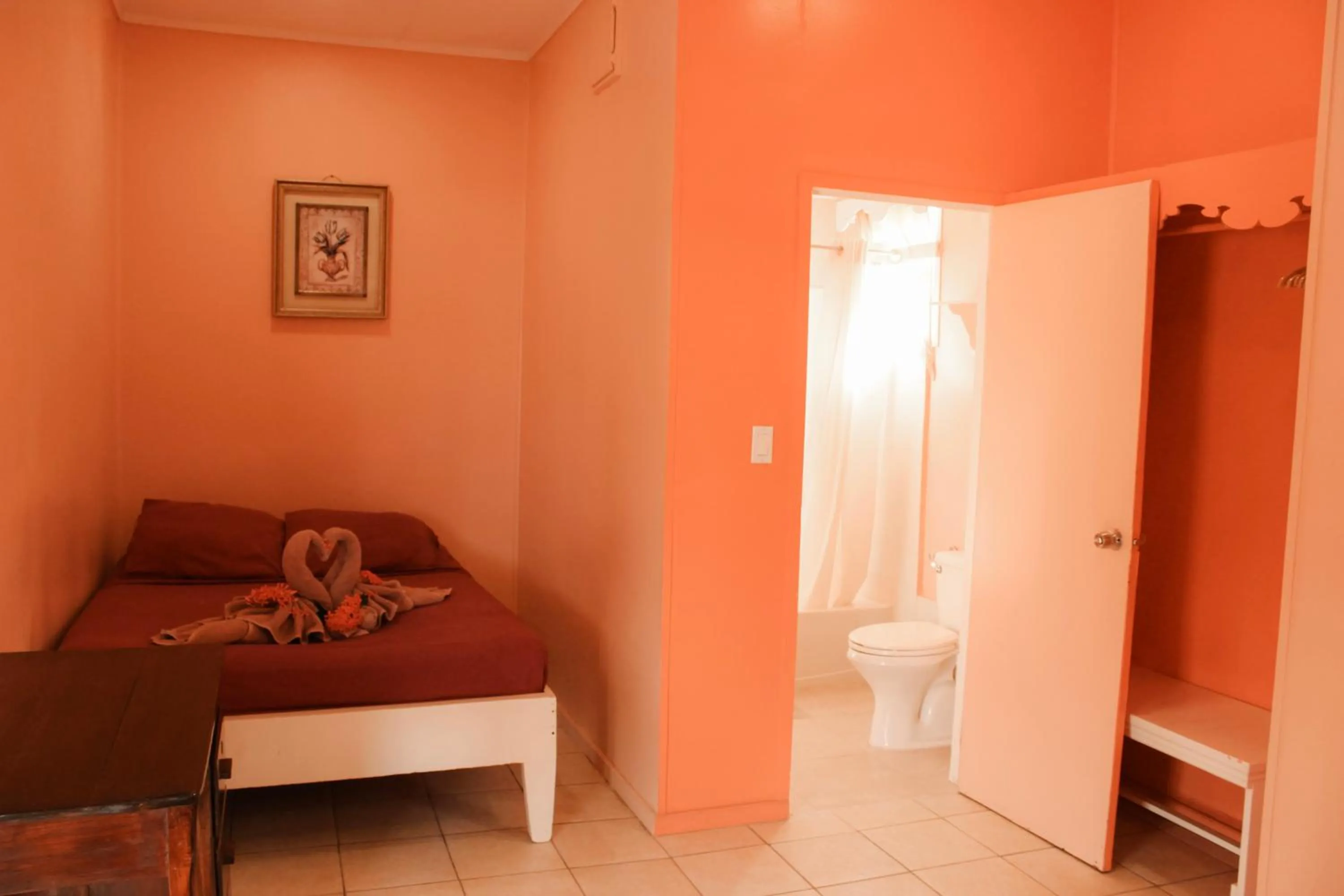 Toilet, Bed in Tropical Paradise Express