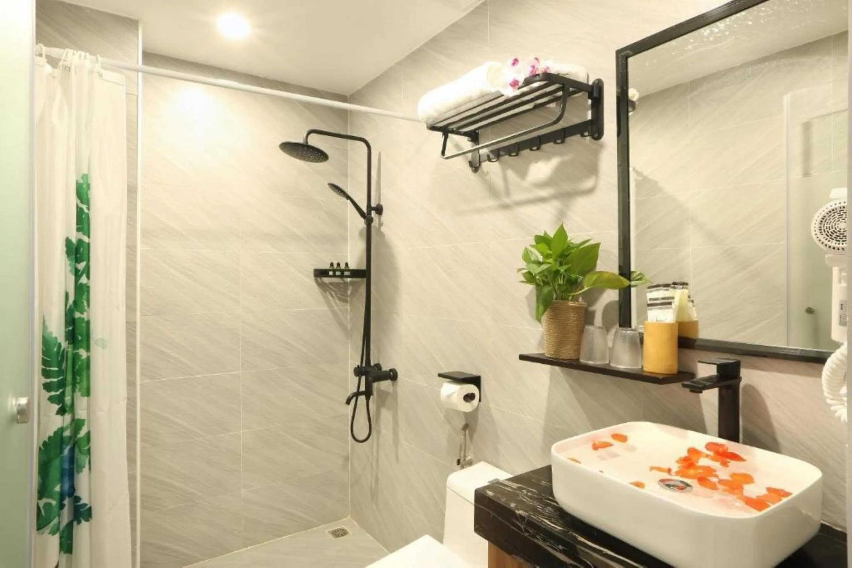 Shower in Mons Boutique Hotel & Apartment