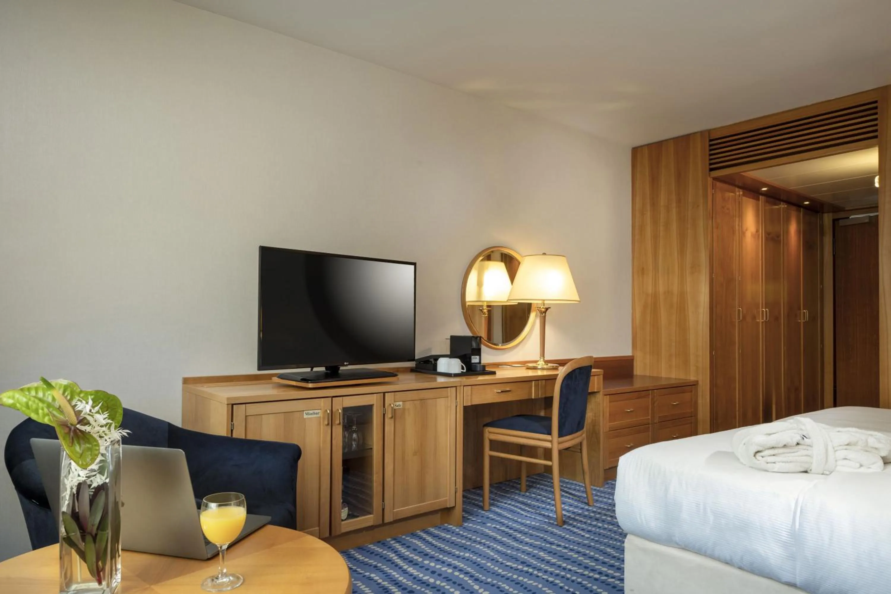 Photo of the whole room, Bed in Maritim Hotel Magdeburg