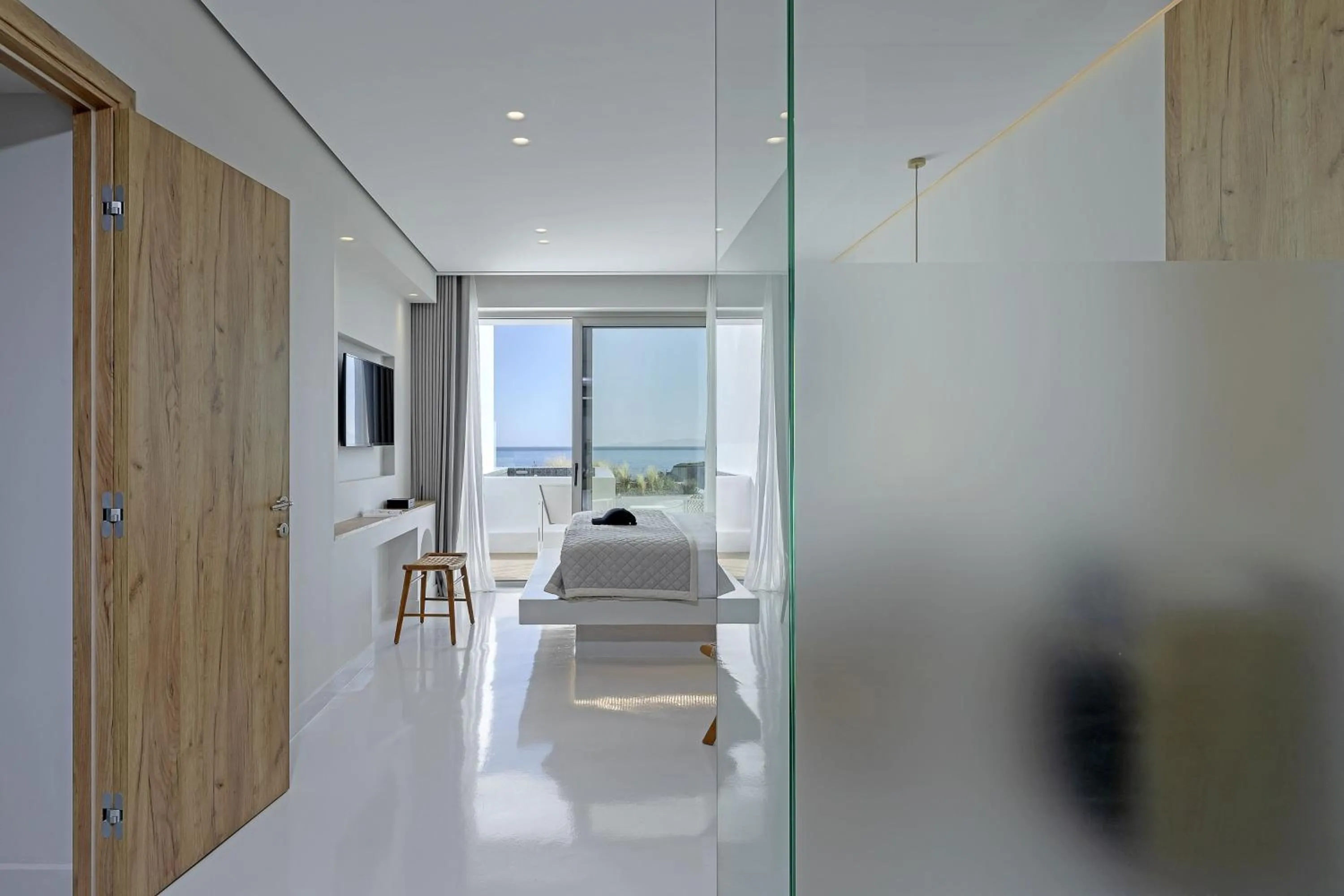 Bed in Infinity View Hotel Tinos