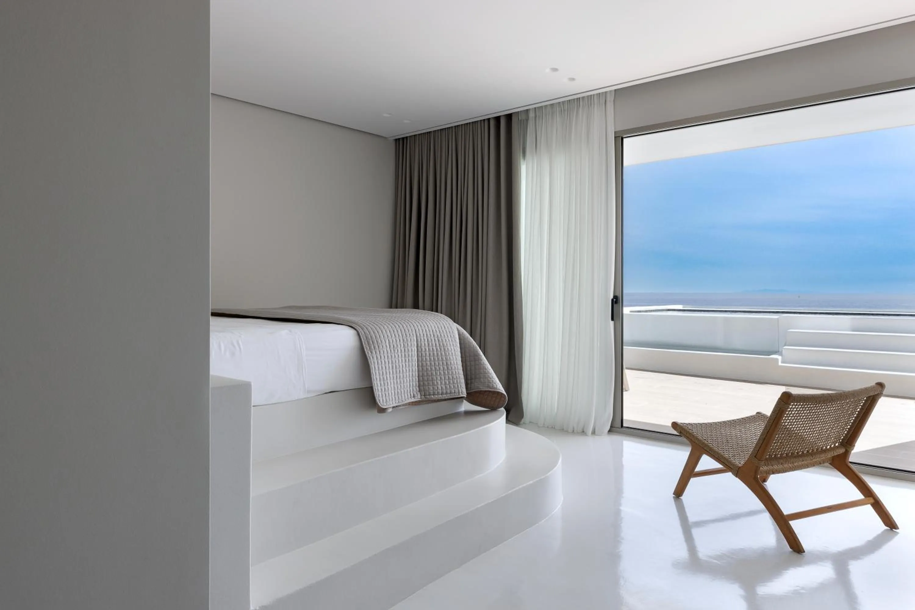 Bed in Infinity View Hotel Tinos