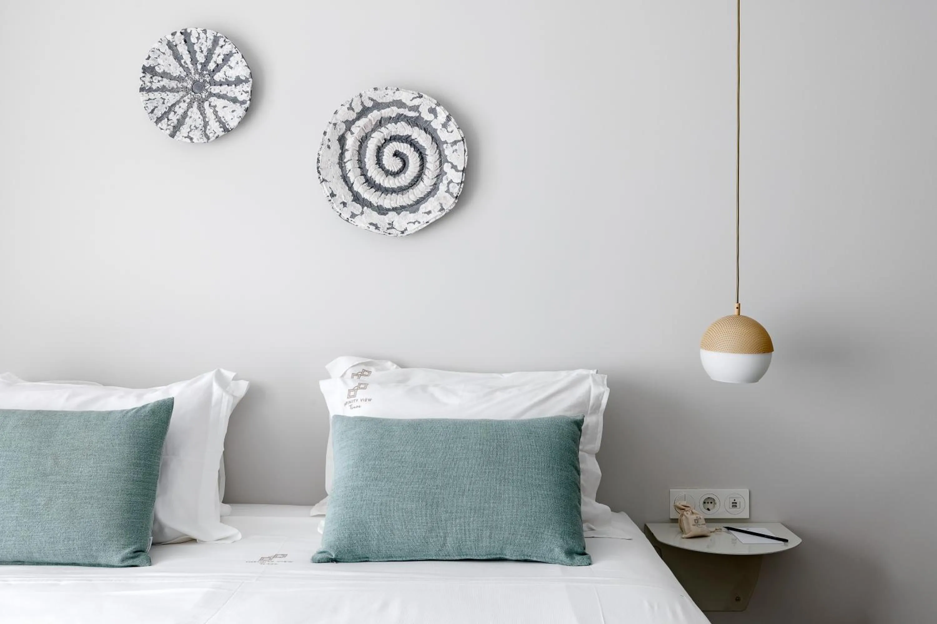 Bed in Infinity View Hotel Tinos