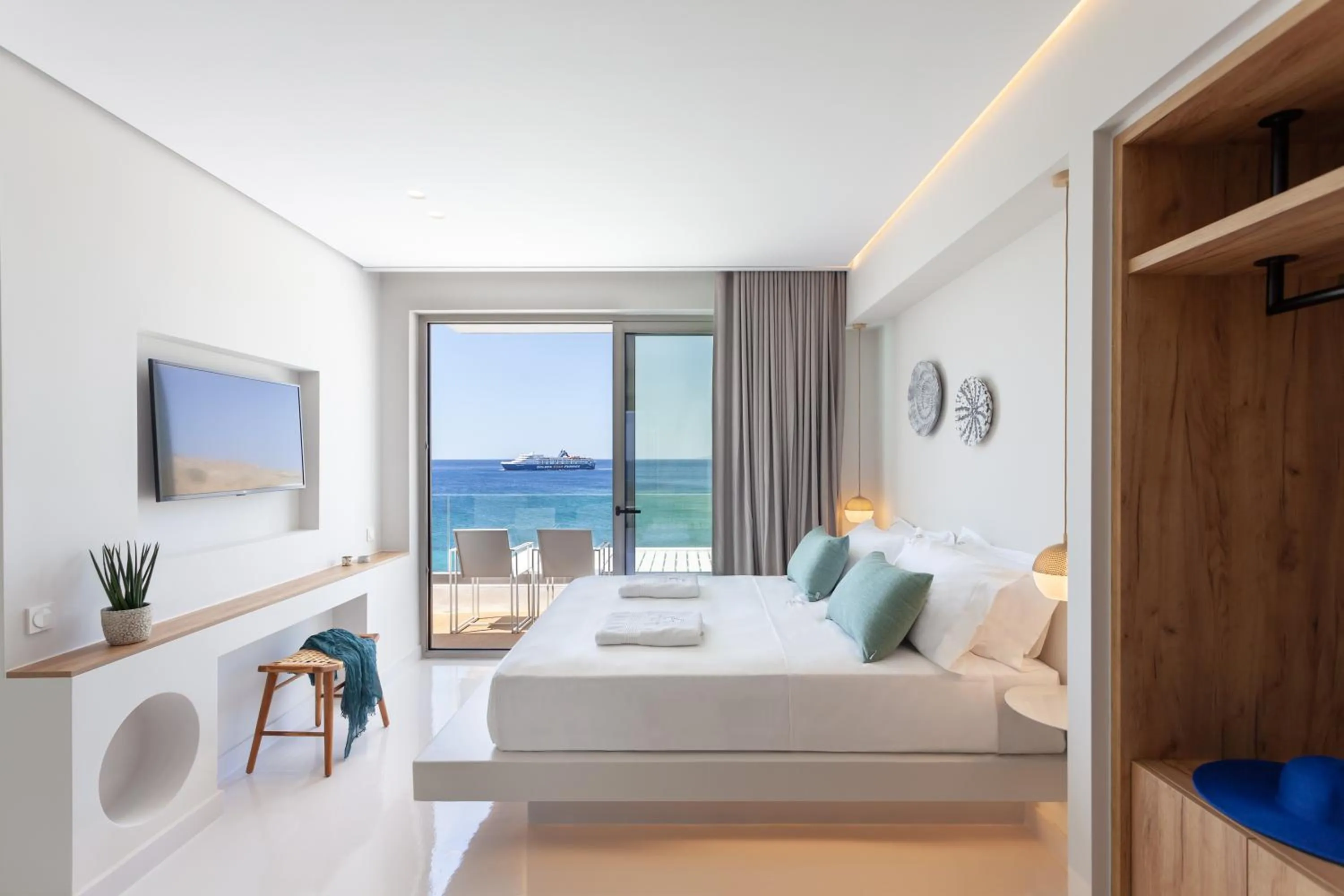 Bed in Infinity View Hotel Tinos