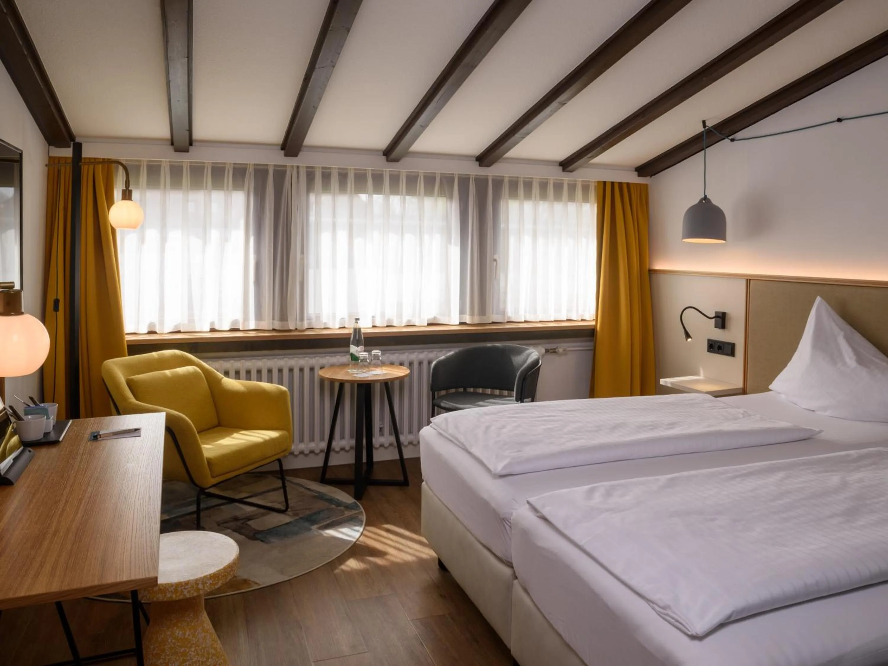 Seating area, Bed in Hotel Schnitterhof