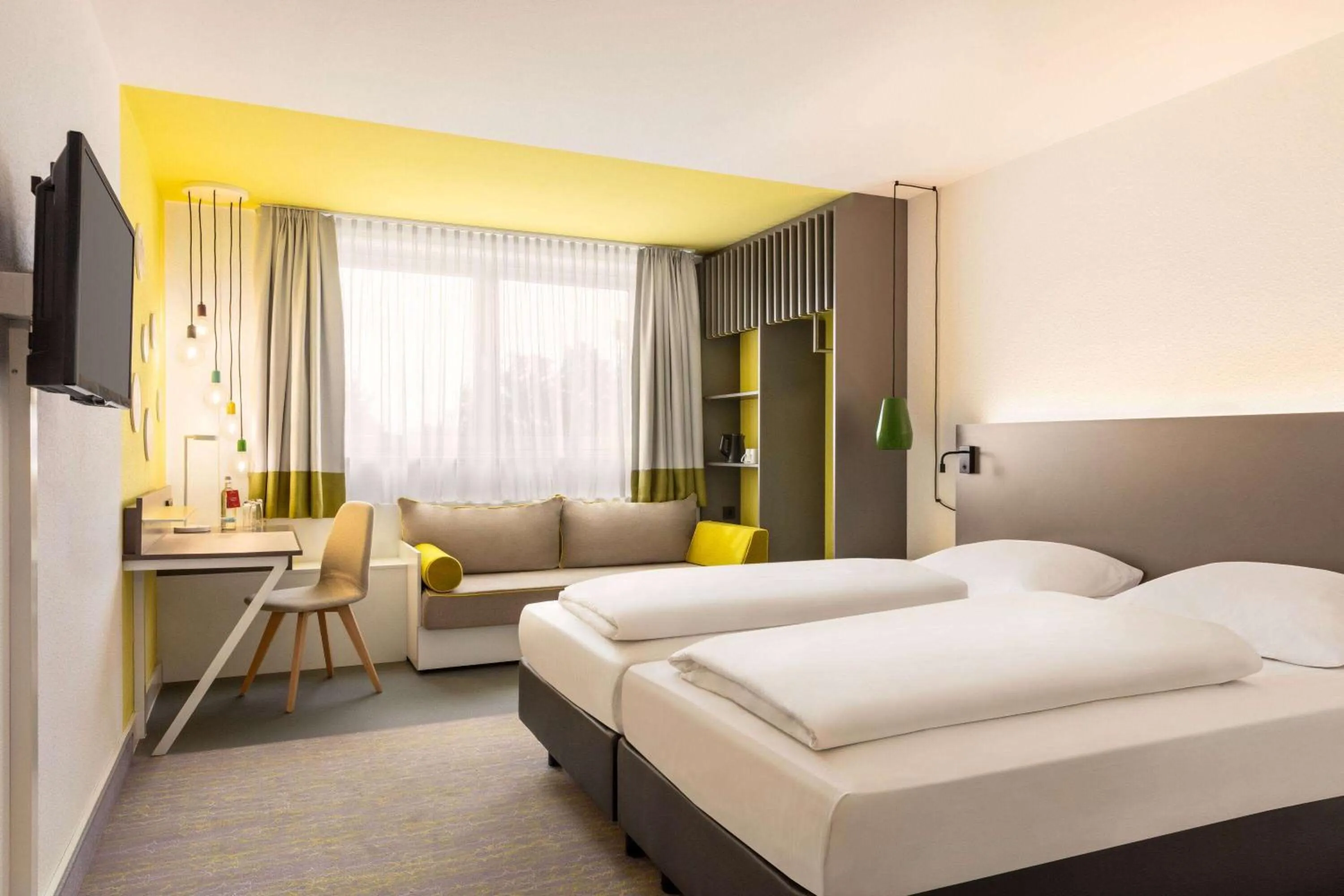 Photo of the whole room, Bed in Vienna House Easy by Wyndham Neckarsulm