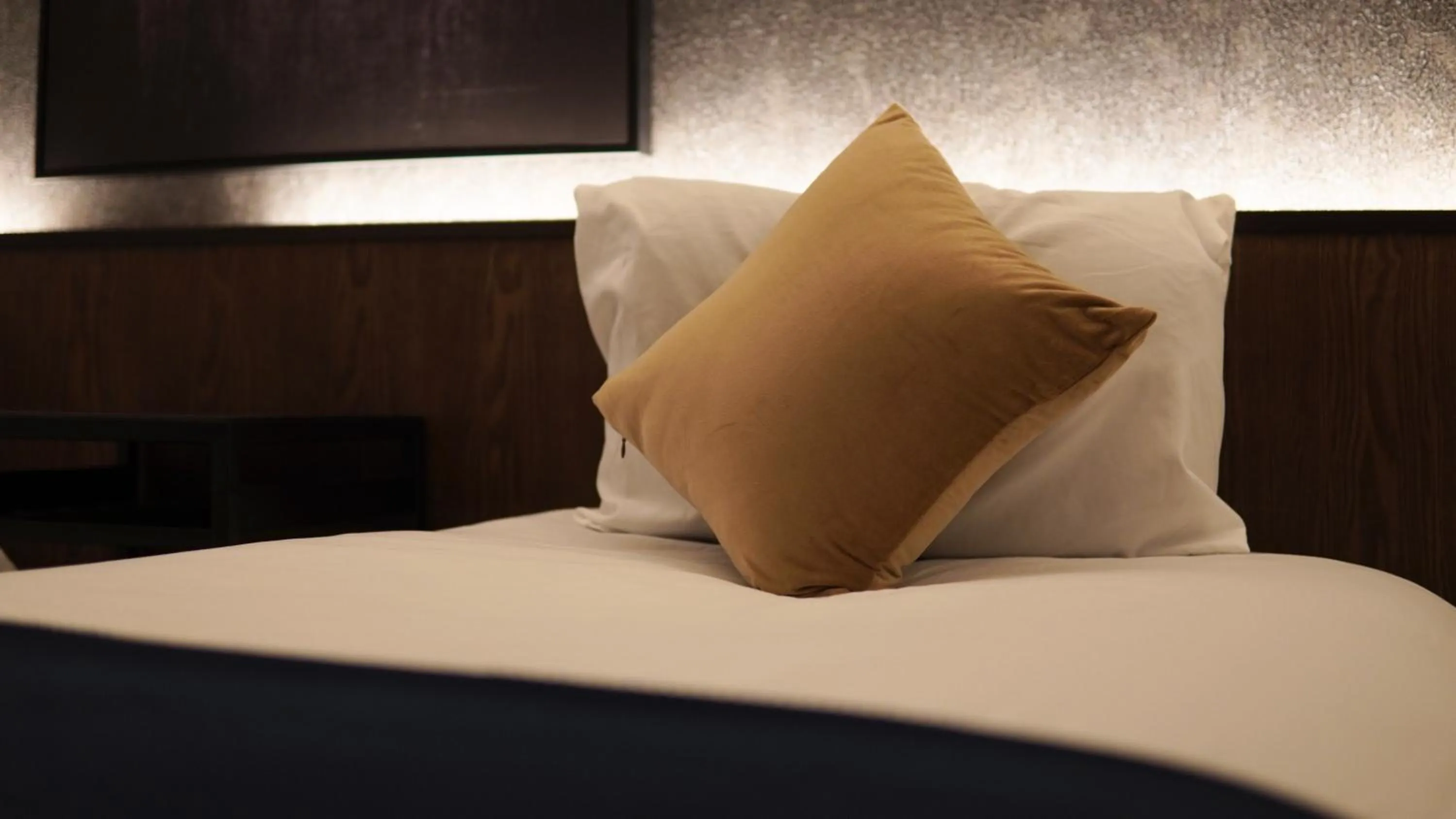 Bed in TAKETO STAY Kotoni