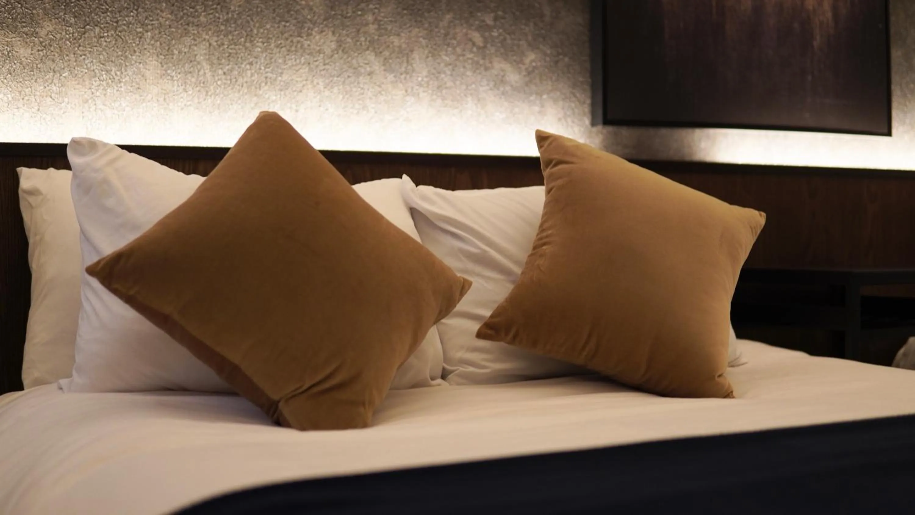 Bed in TAKETO STAY Kotoni