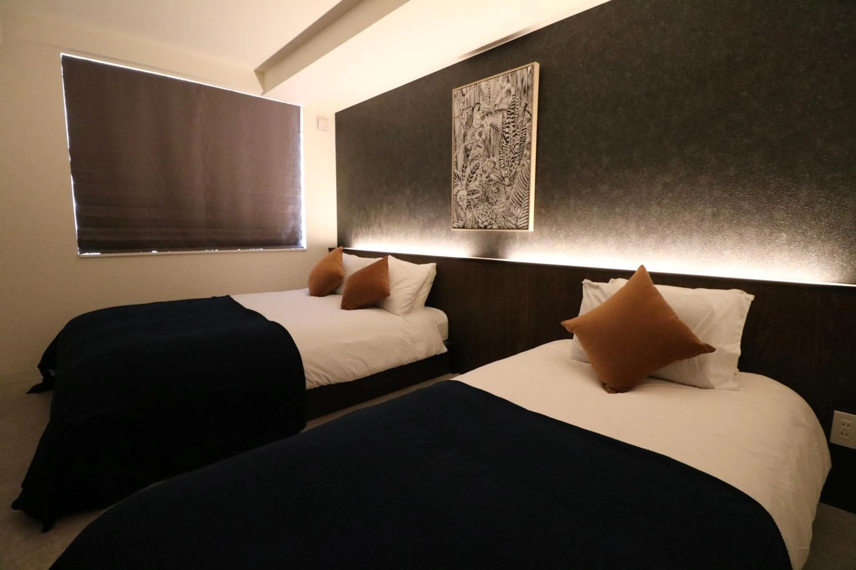 Bed in TAKETO STAY Kotoni