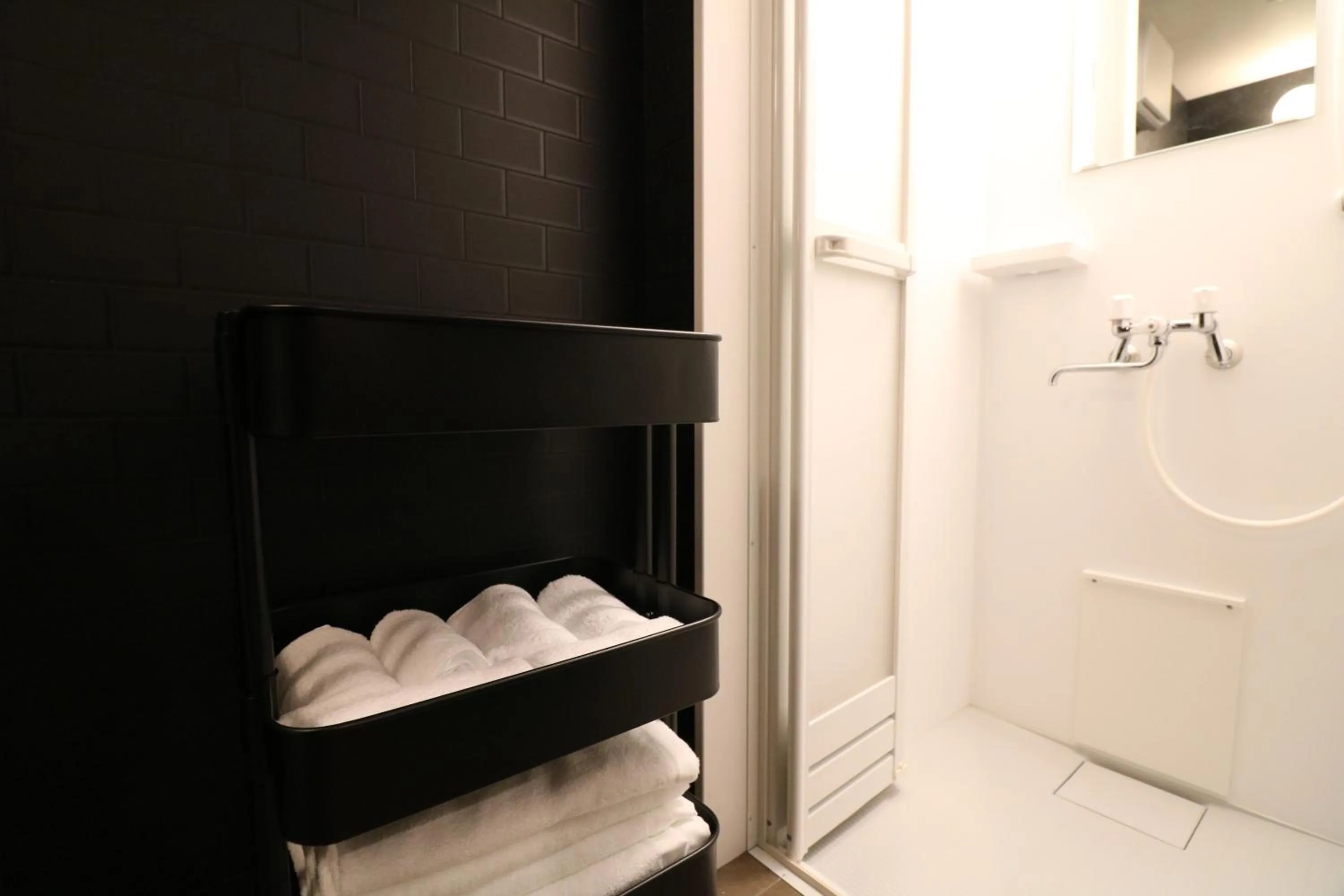 Shower in TAKETO STAY Kotoni