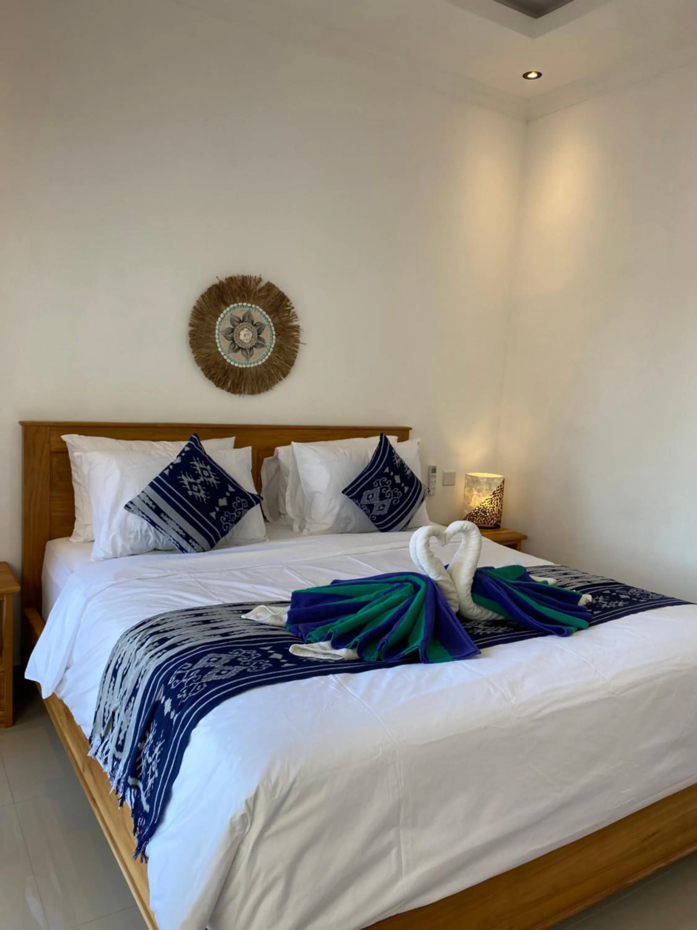 Bed in The Pulau Bungalow