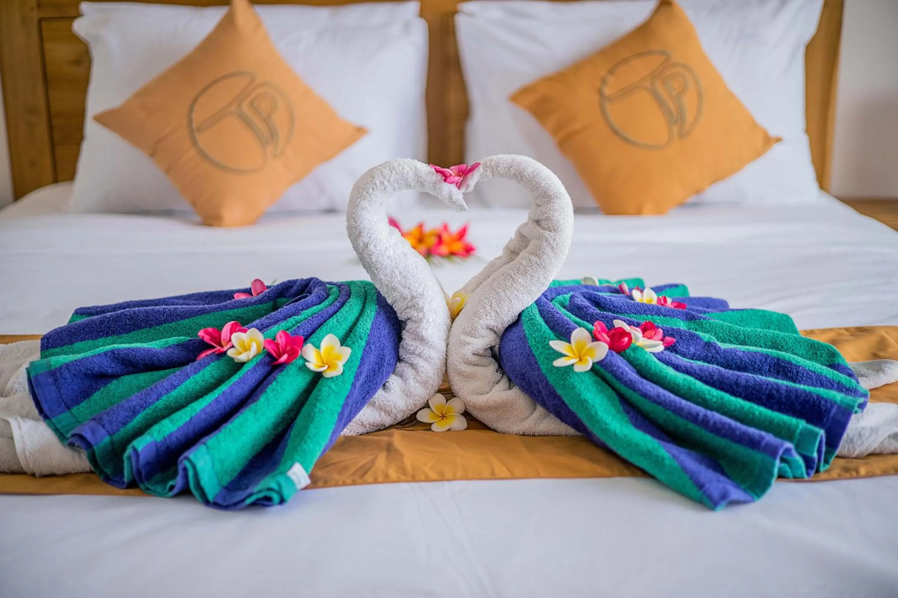 Bed in The Pulau Bungalow