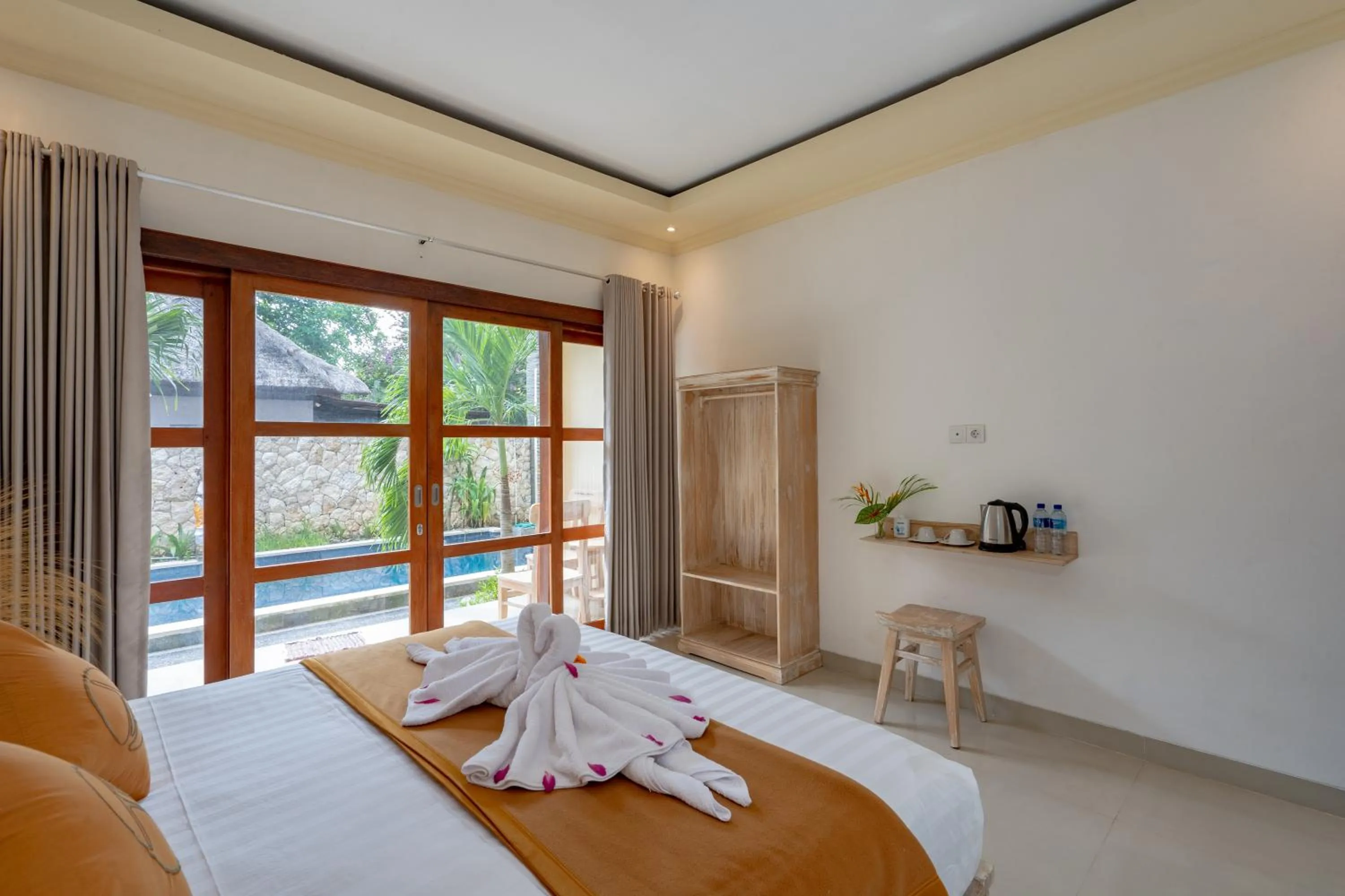 Bed in The Pulau Bungalow