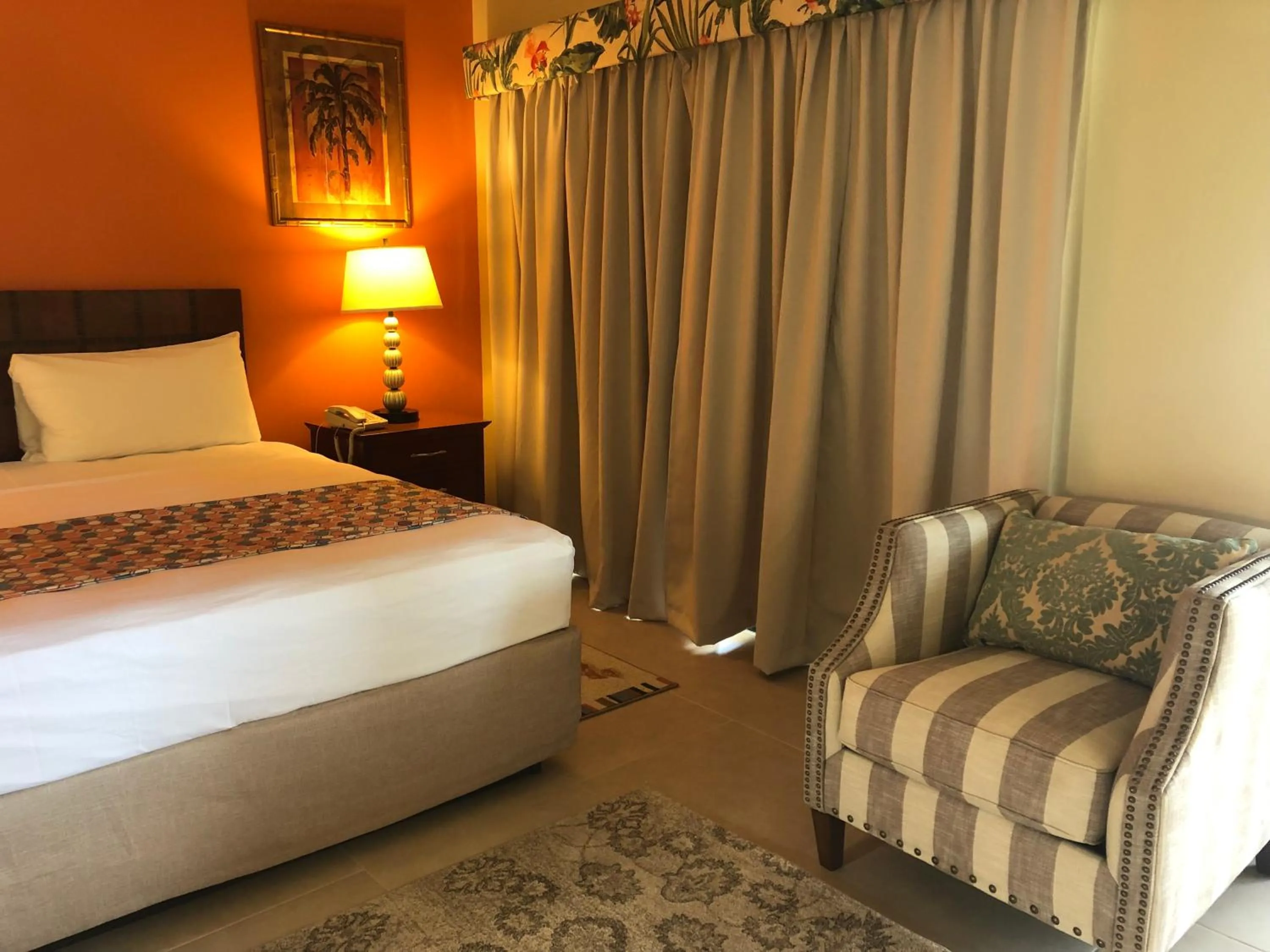 Bed in Carl's Unique Inn & Conference Facilities